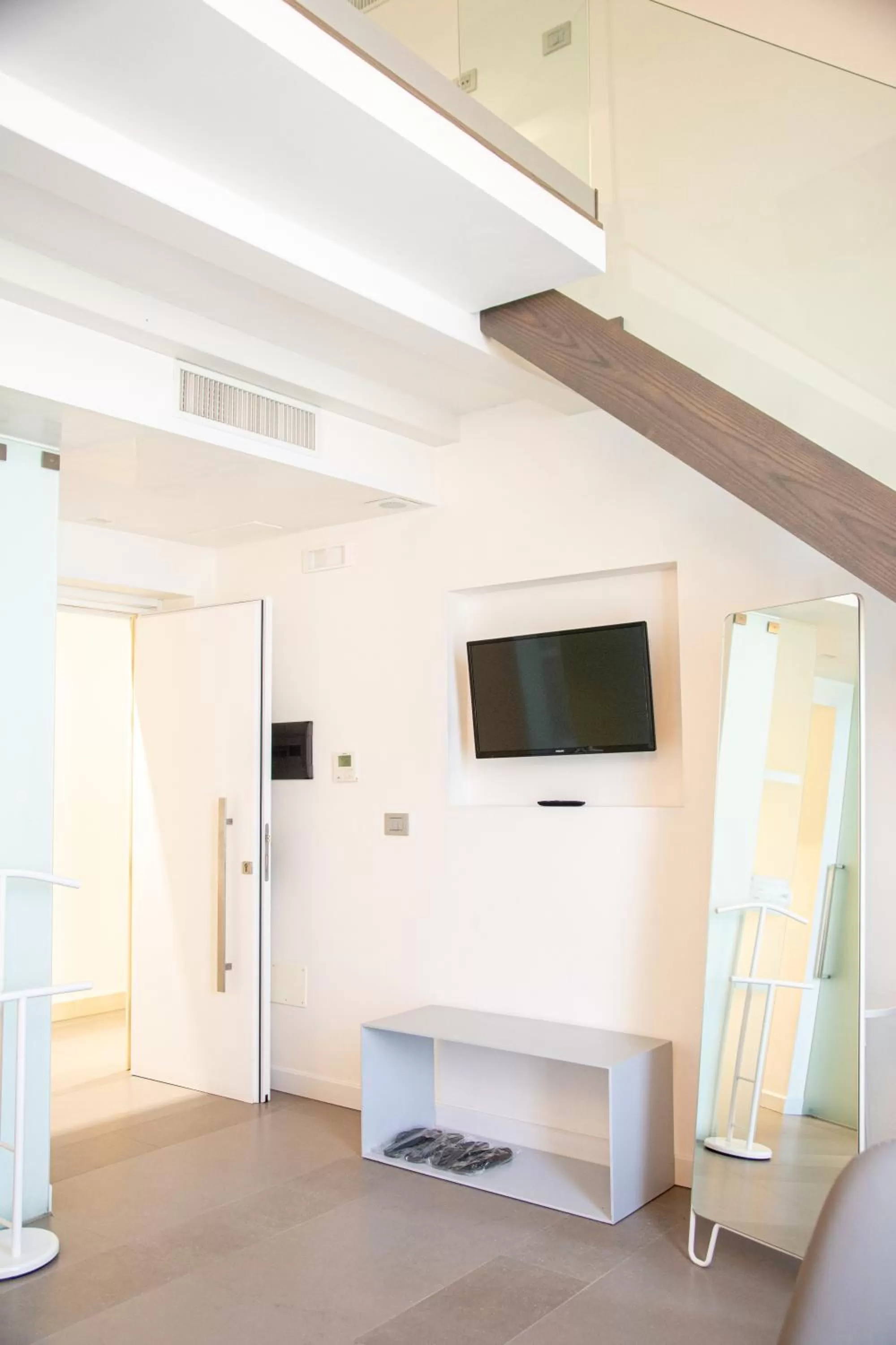 TV and multimedia in Caportigia Boutique Hotel