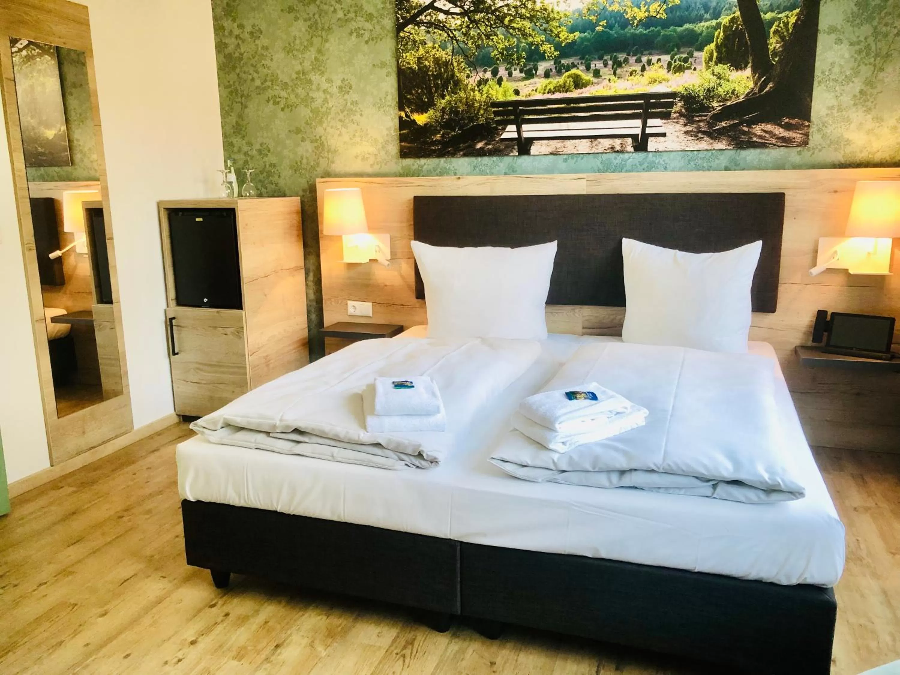 Photo of the whole room, Bed in Landhotel Gutshof im Oertzetal in Oldendorf, Südheide