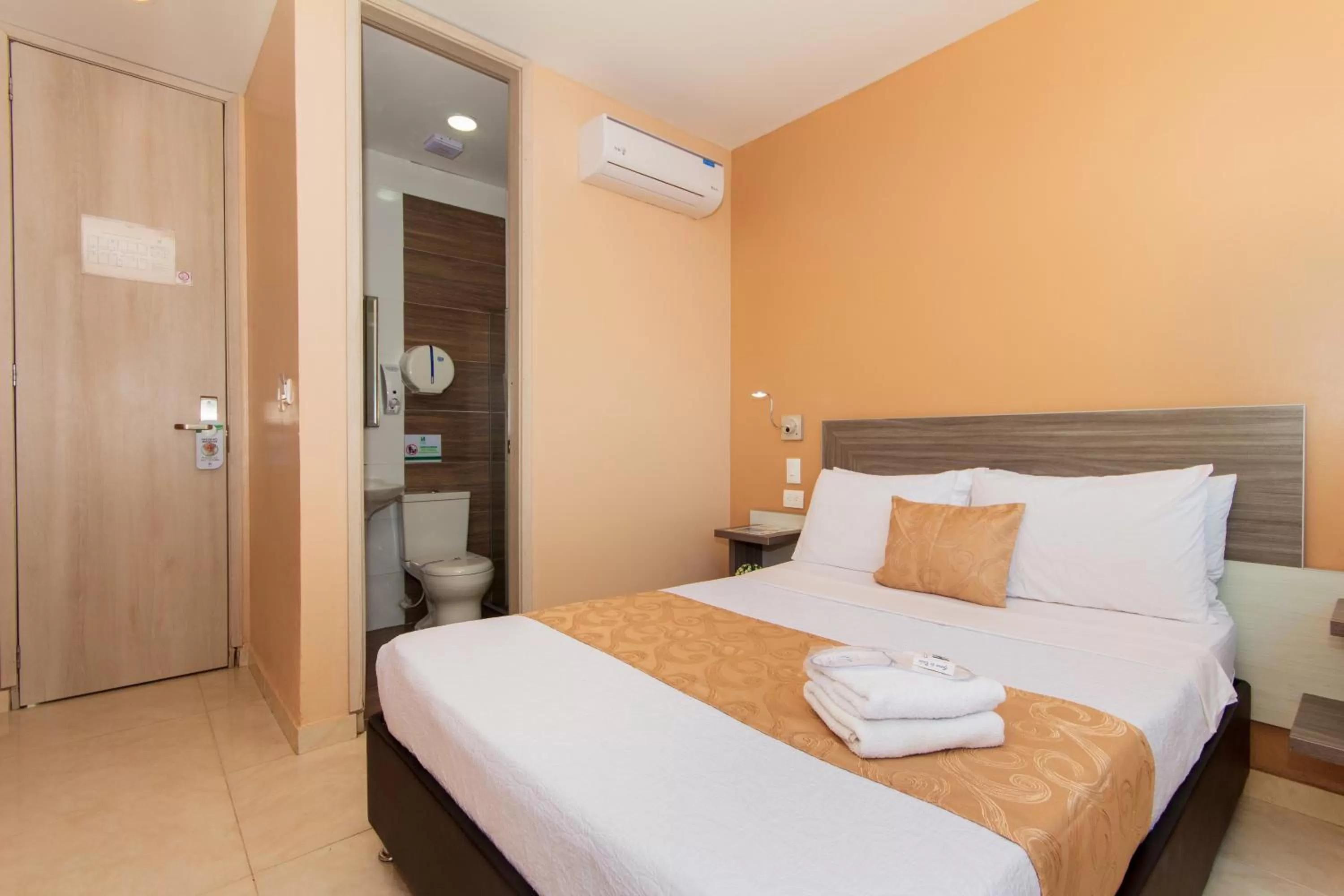 Bedroom in Hotel Aixo Suites By GEH Suites