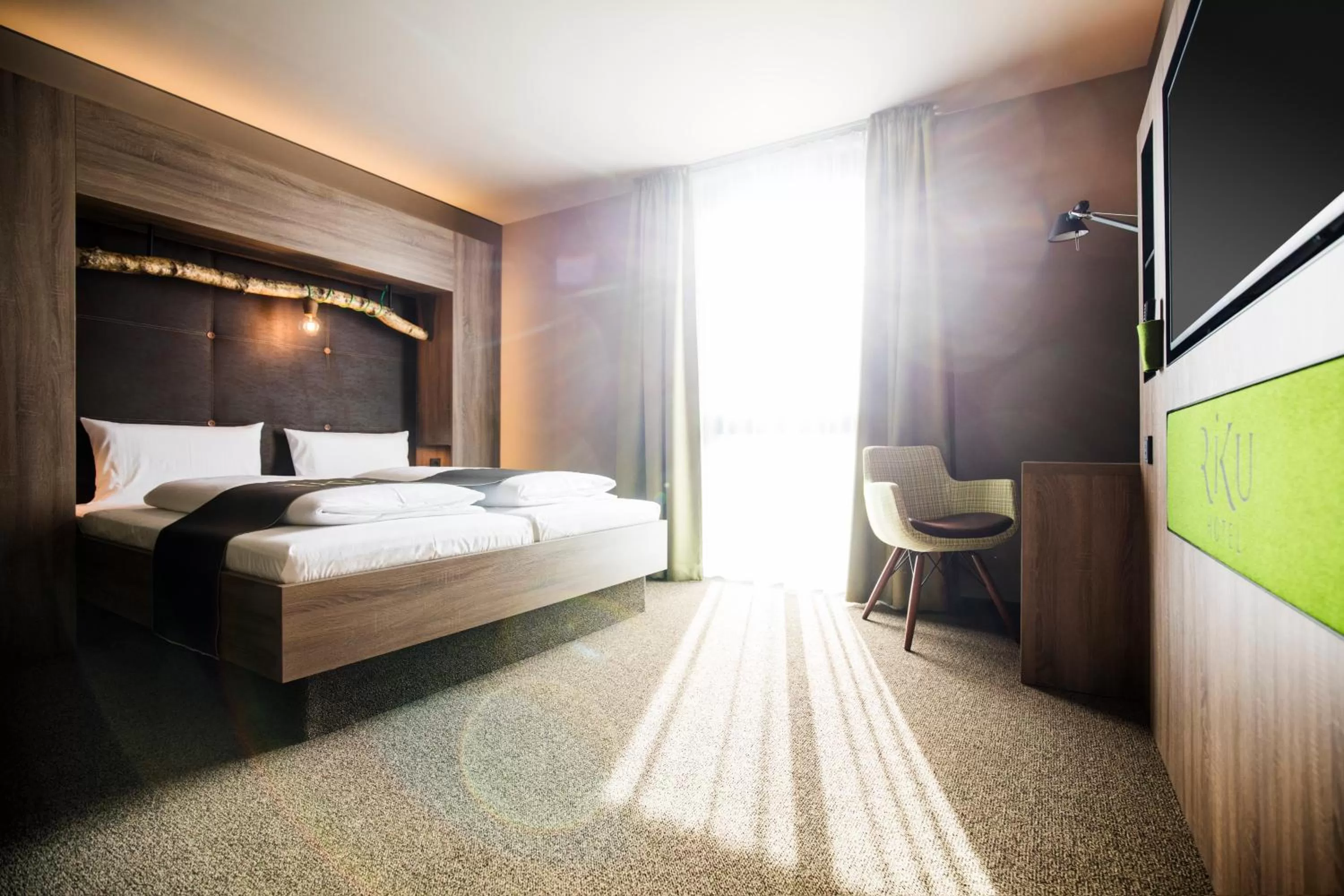 Photo of the whole room, Bed in RiKu HOTEL Pfullendorf