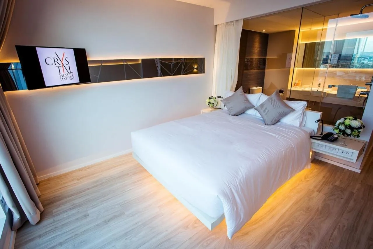 Photo of the whole room, Bed in Crystal Hotel Hat Yai