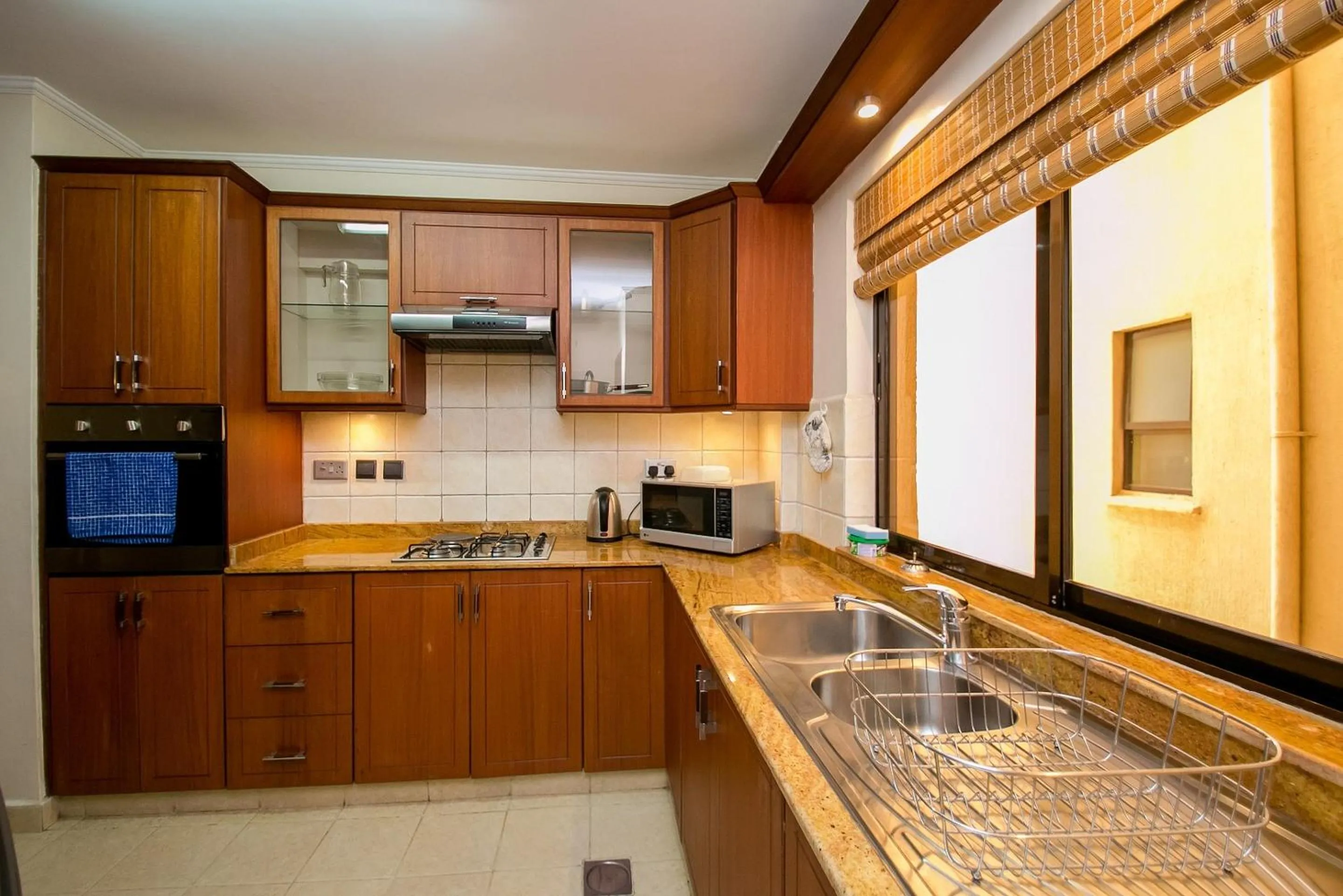 Kitchen or kitchenette in Waridi Paradise Hotel and Suites