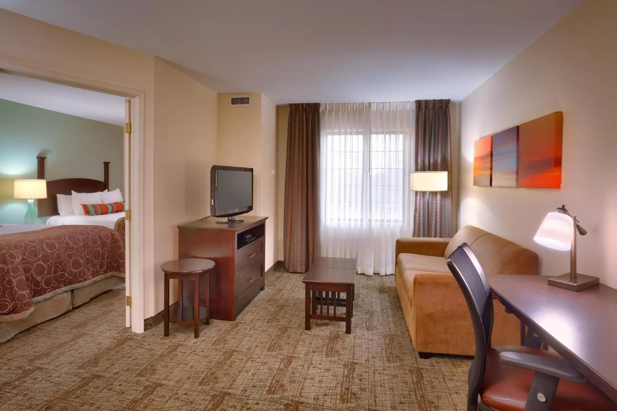 Photo of the whole room, Bed in Staybridge Suites Peoria Downtown by IHG