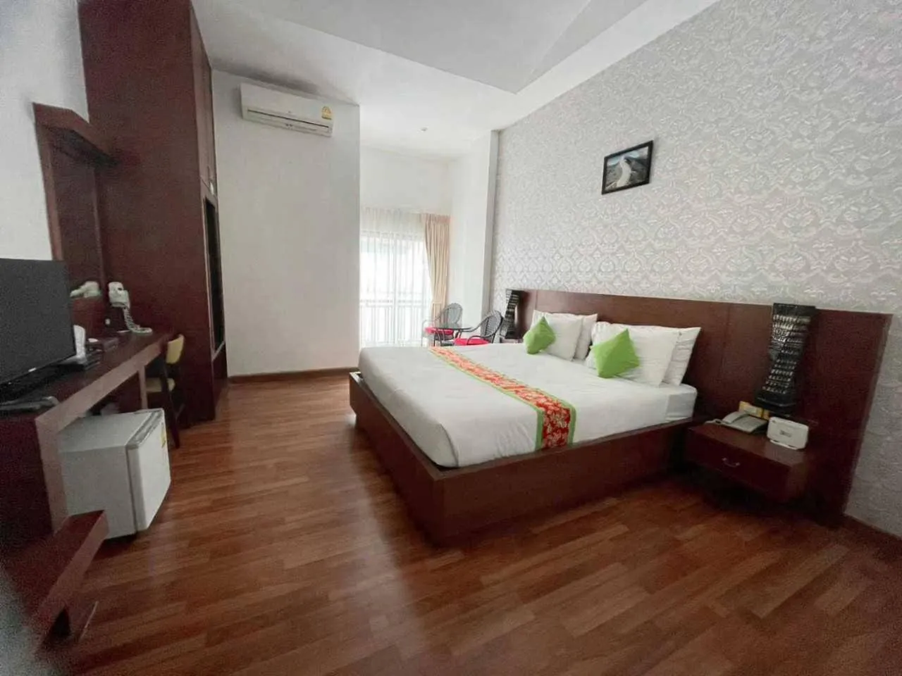 Bed in Jingjit Hotel