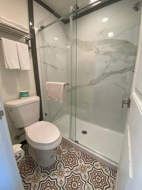 Bathroom in Super 8 by Wyndham Oceanside Downtown