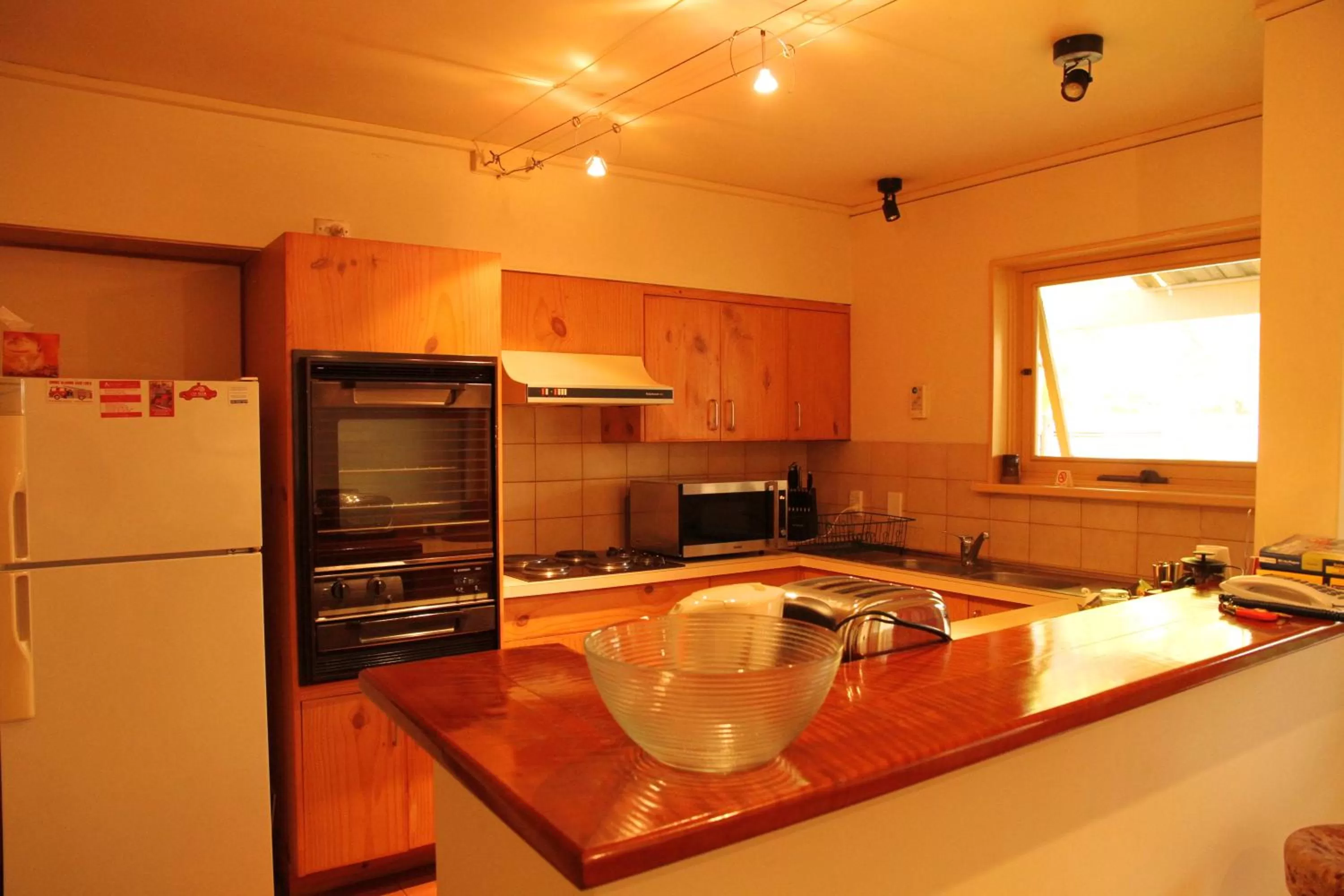 Kitchen or kitchenette in North Adelaide Heritage Cottages & Apartments
