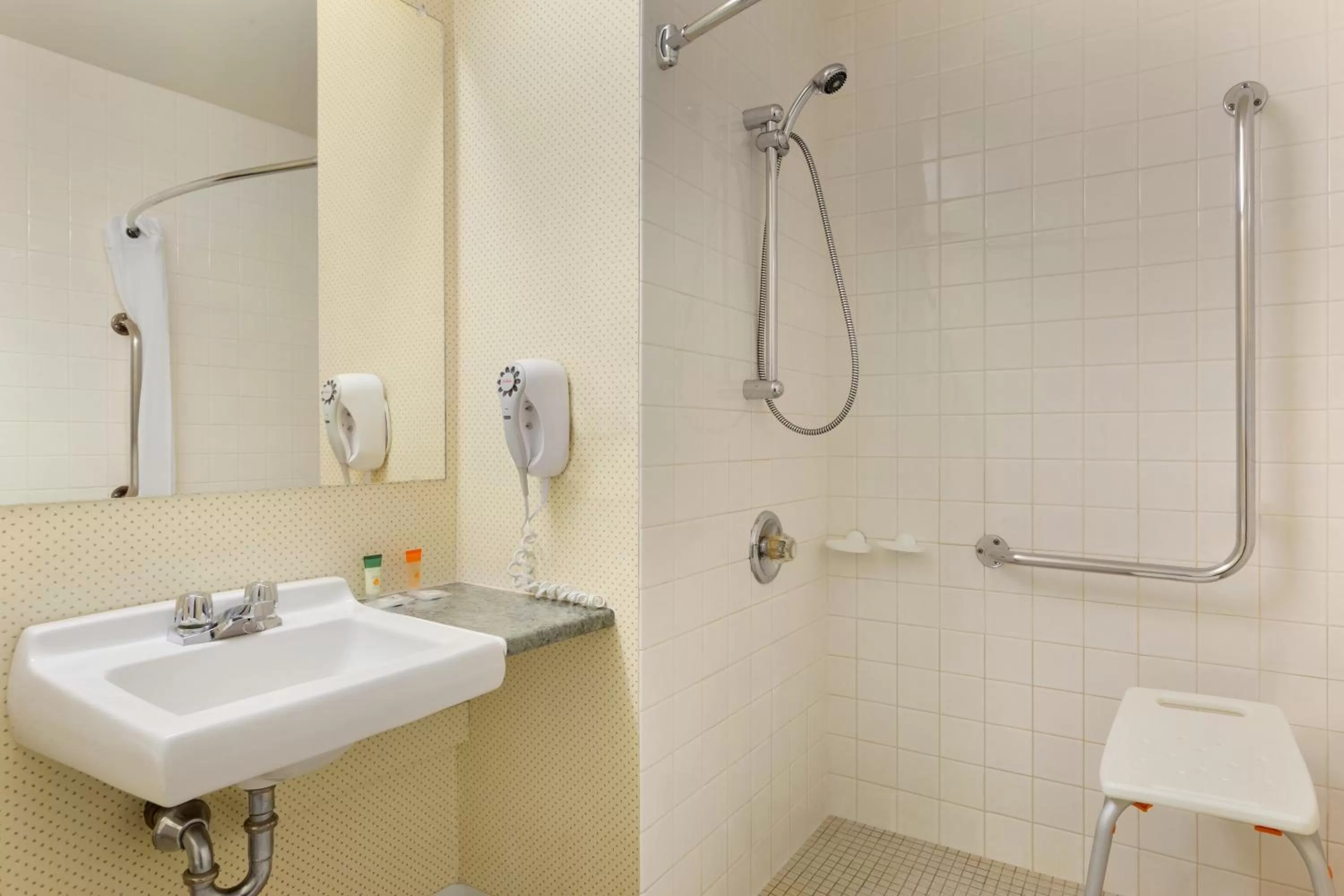 Bathroom in Travelodge by Wyndham North Bay Lakeshore
