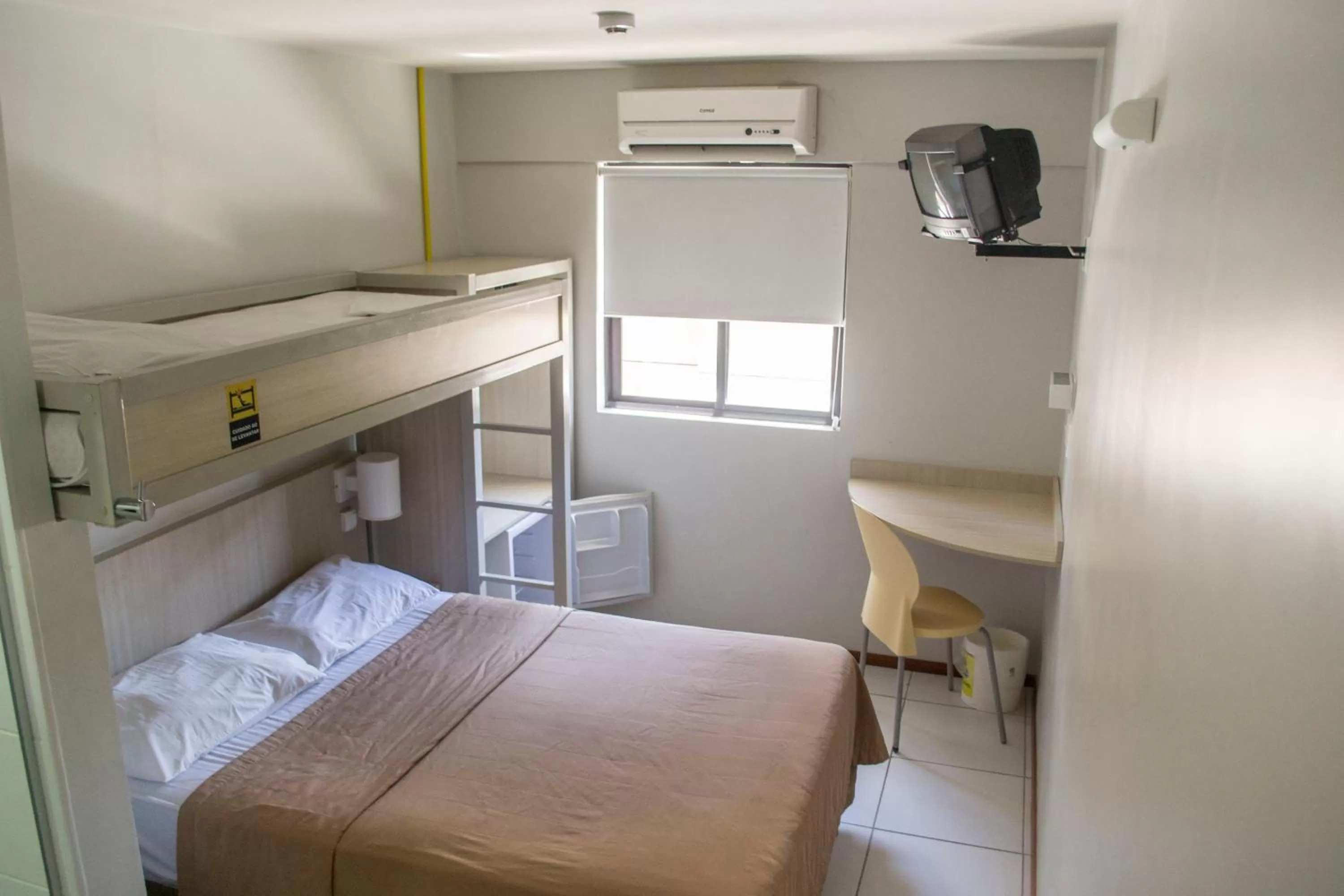 Bed in EXPRESSO R1 HOTEL