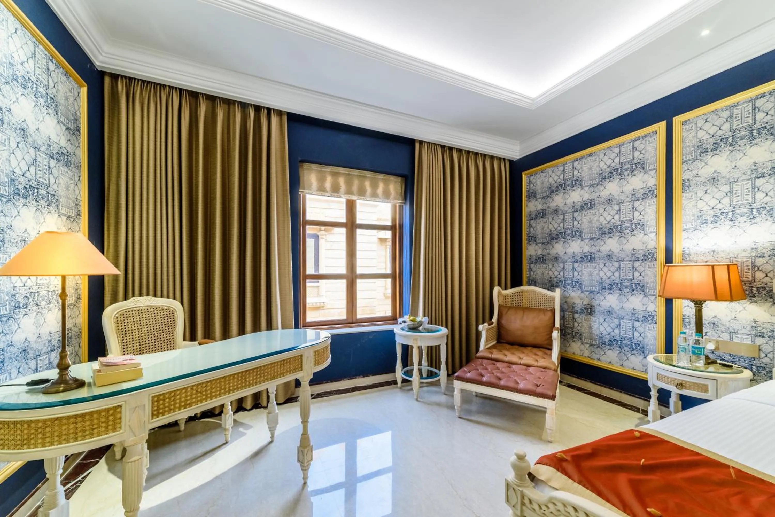 Seating area, Bed in Fort Rajwada,Jaisalmer