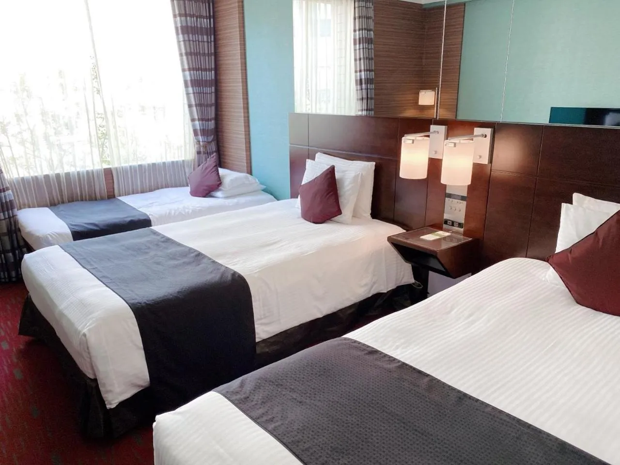 Bed in Hotel Trusty Tokyo Bayside