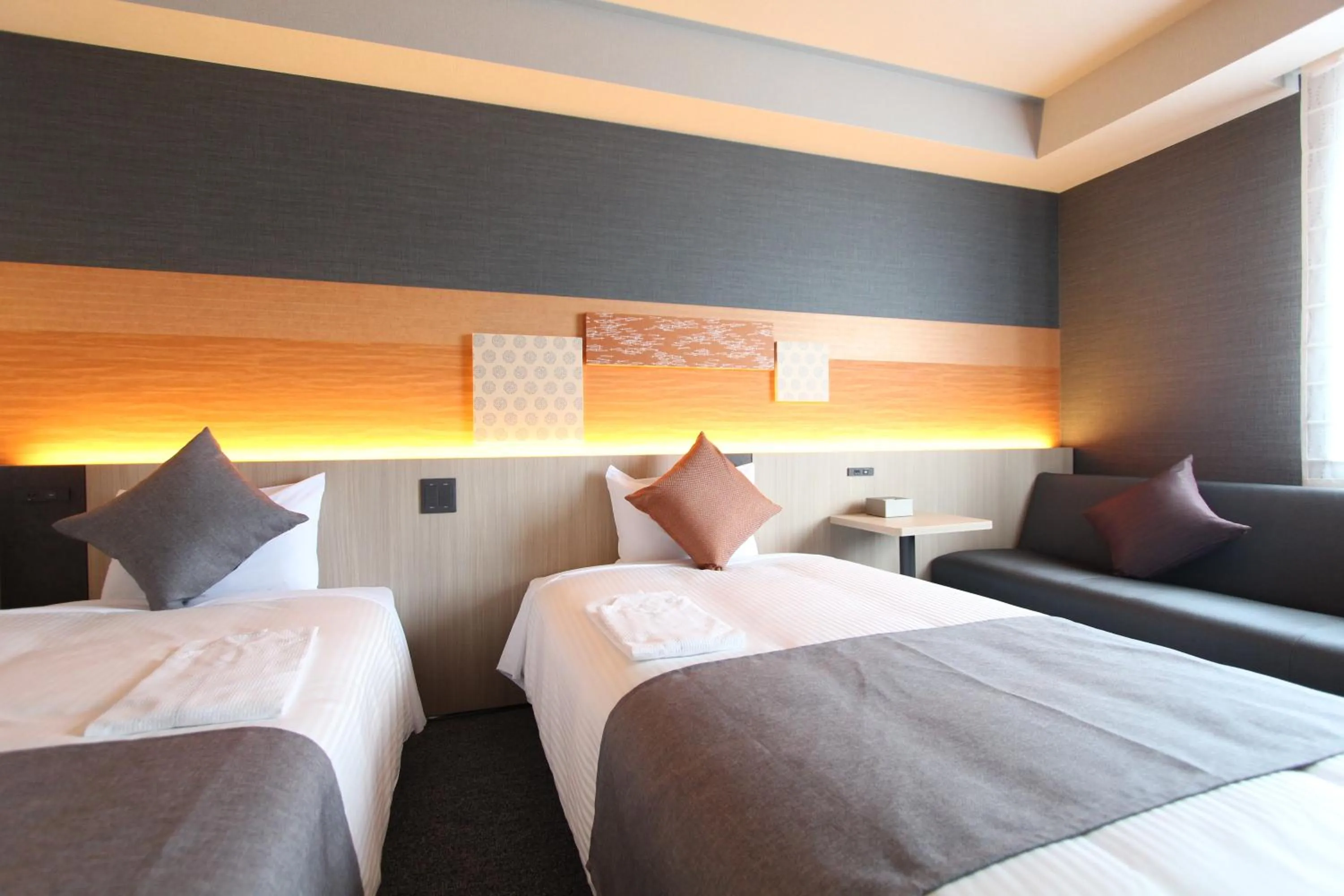 Bed in KOKO HOTEL Tsukiji Ginza