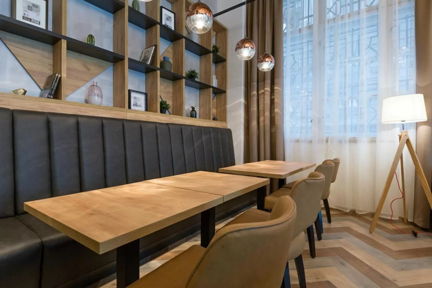 Communal lounge/ TV room in Capital Hotel Garni