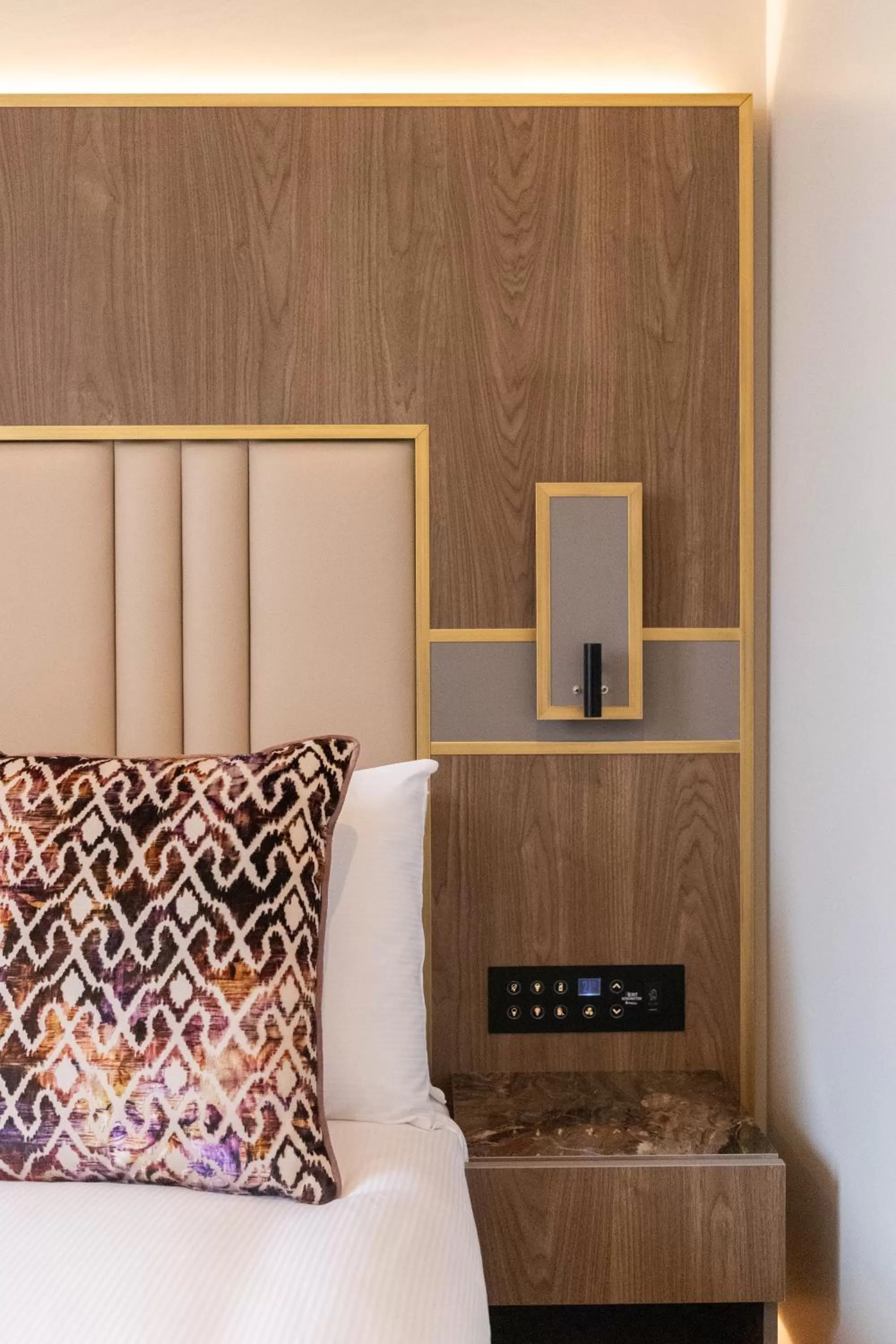 Bed in Merit Kensington Hotel