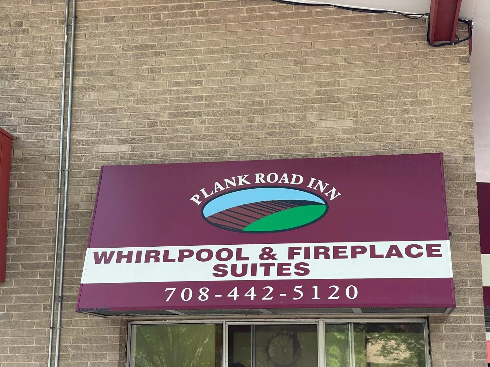 Property logo or sign in VIBE INN - WHIRLPOOLS SUITES - Lyons