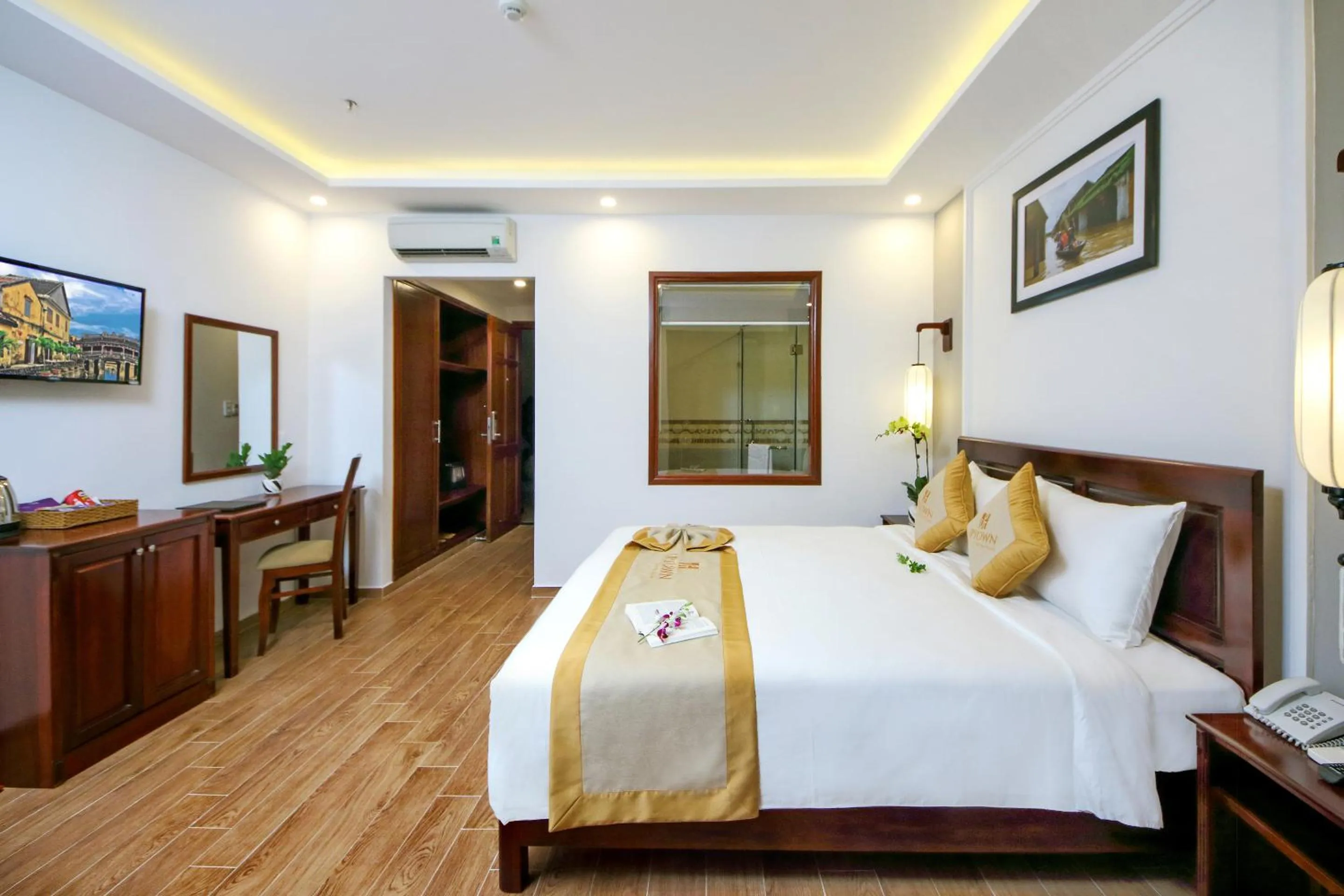 Photo of the whole room, Bed in Uptown Hoi An Hotel & Spa