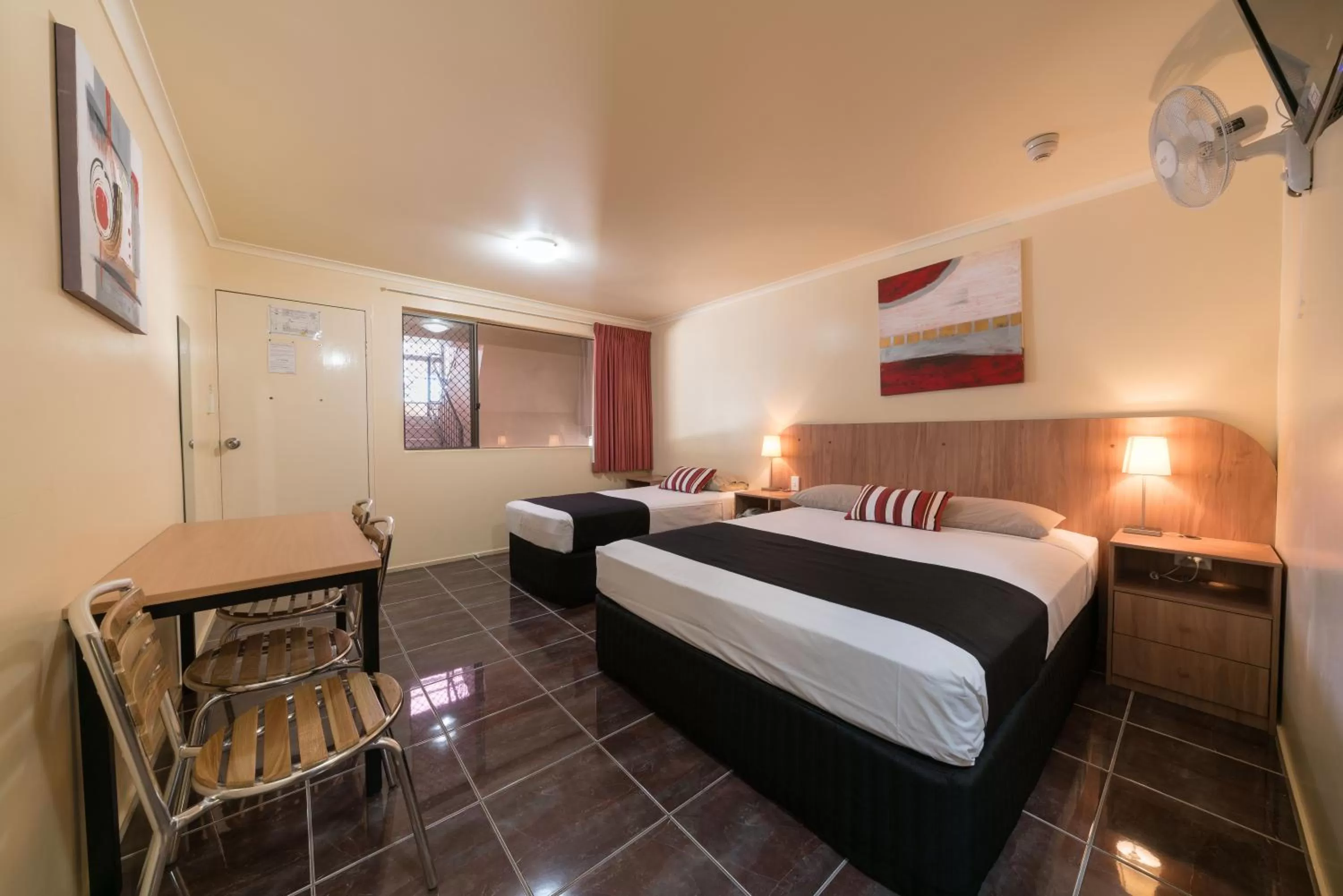 Bed in Winter Sun Motel