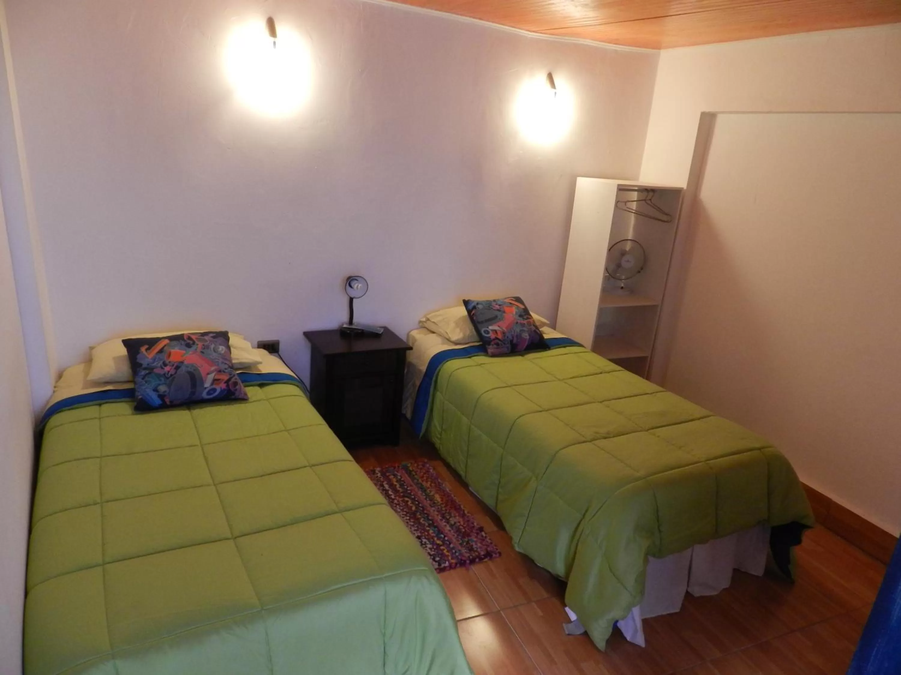 Photo of the whole room, Bed in Hostal Siete Colores