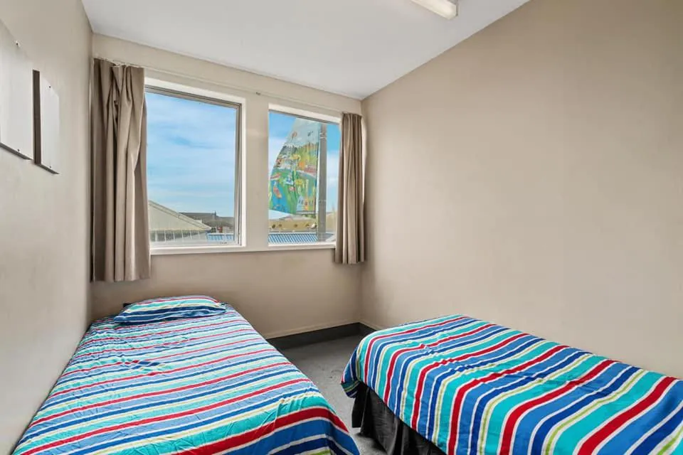 Bed in Point Break Backpackers