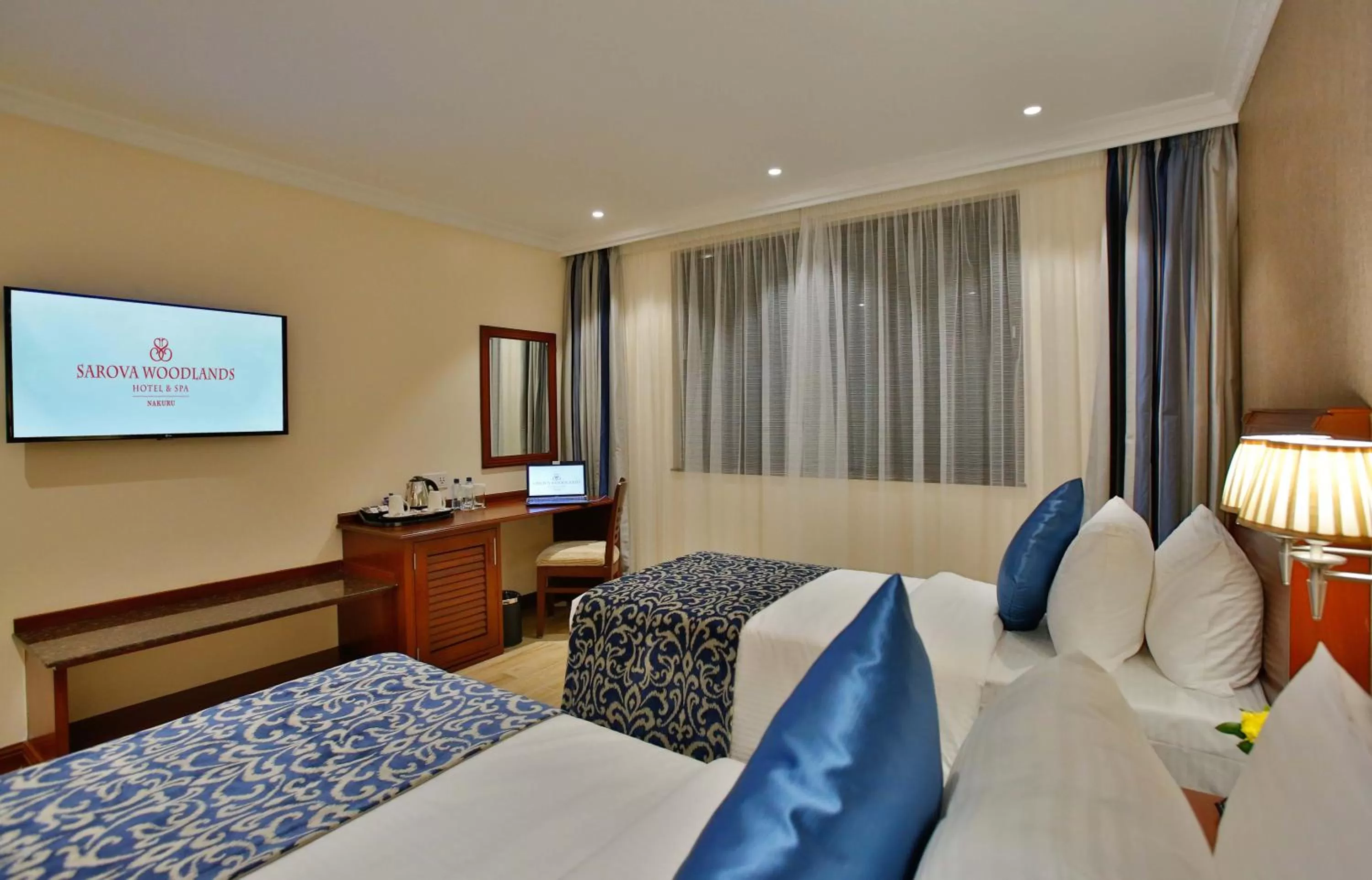 Bed in Sarova Woodlands Hotel and Spa