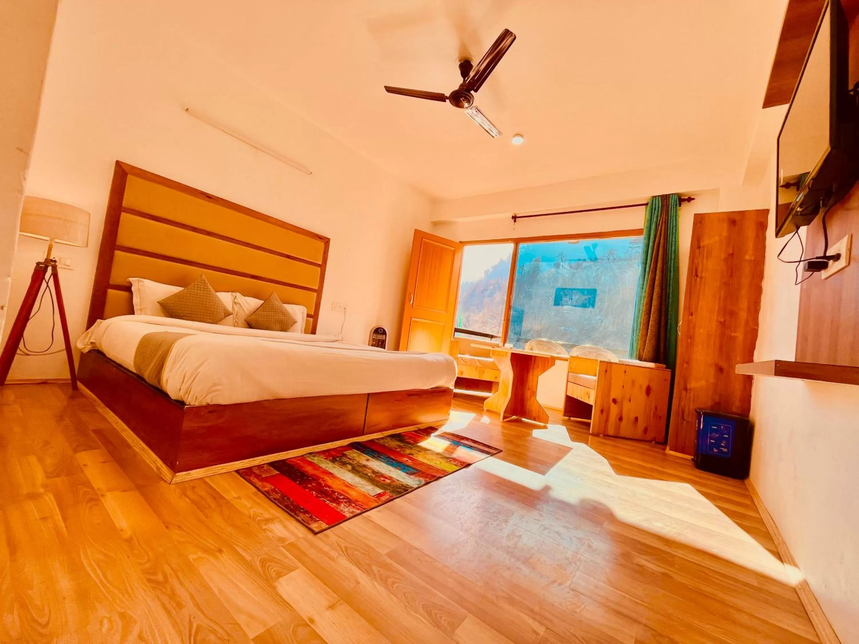 Bed in Himalayan Riverside Resort, Manali