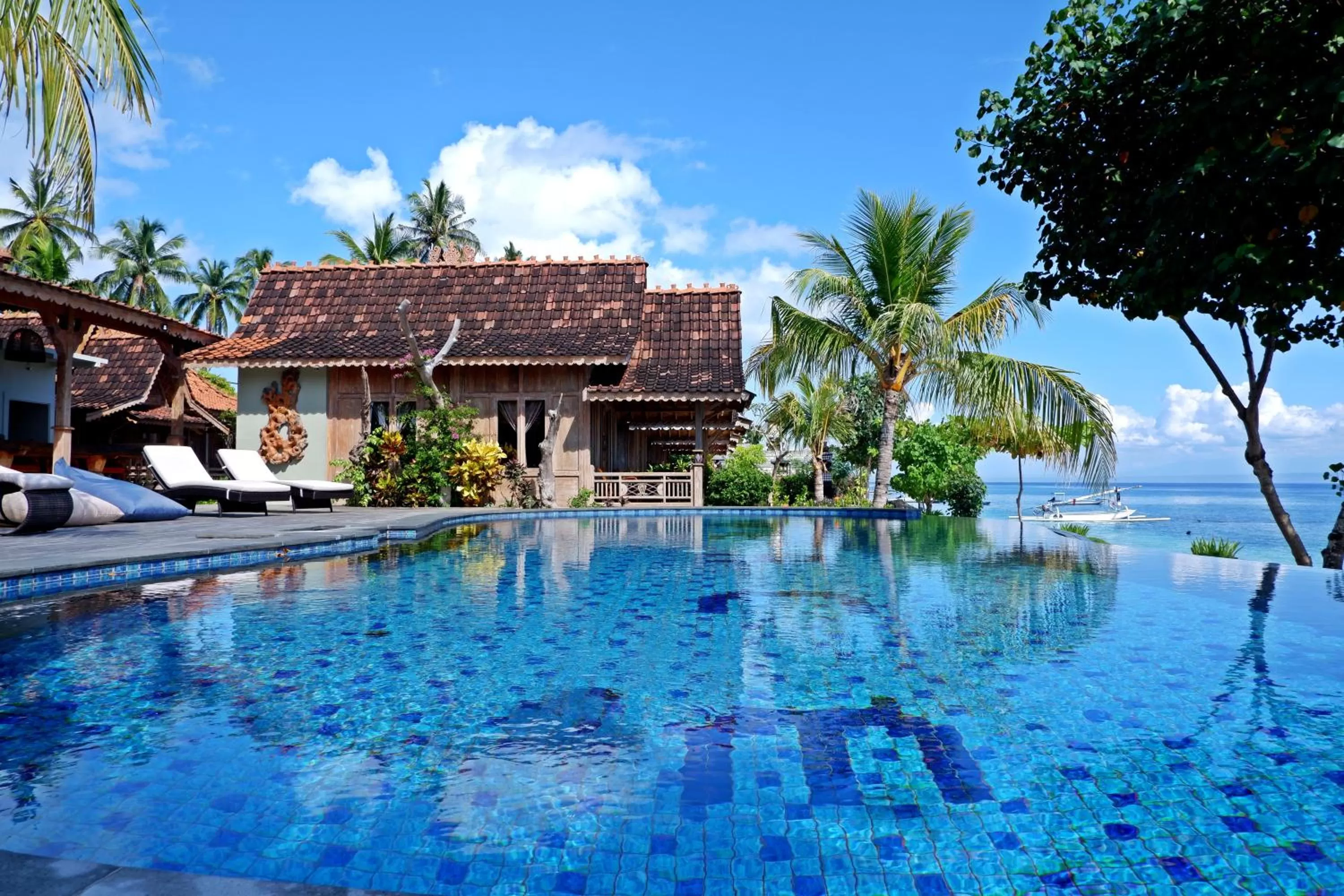 Swimming pool in Blue Harbor Beachfront Villas & Resto