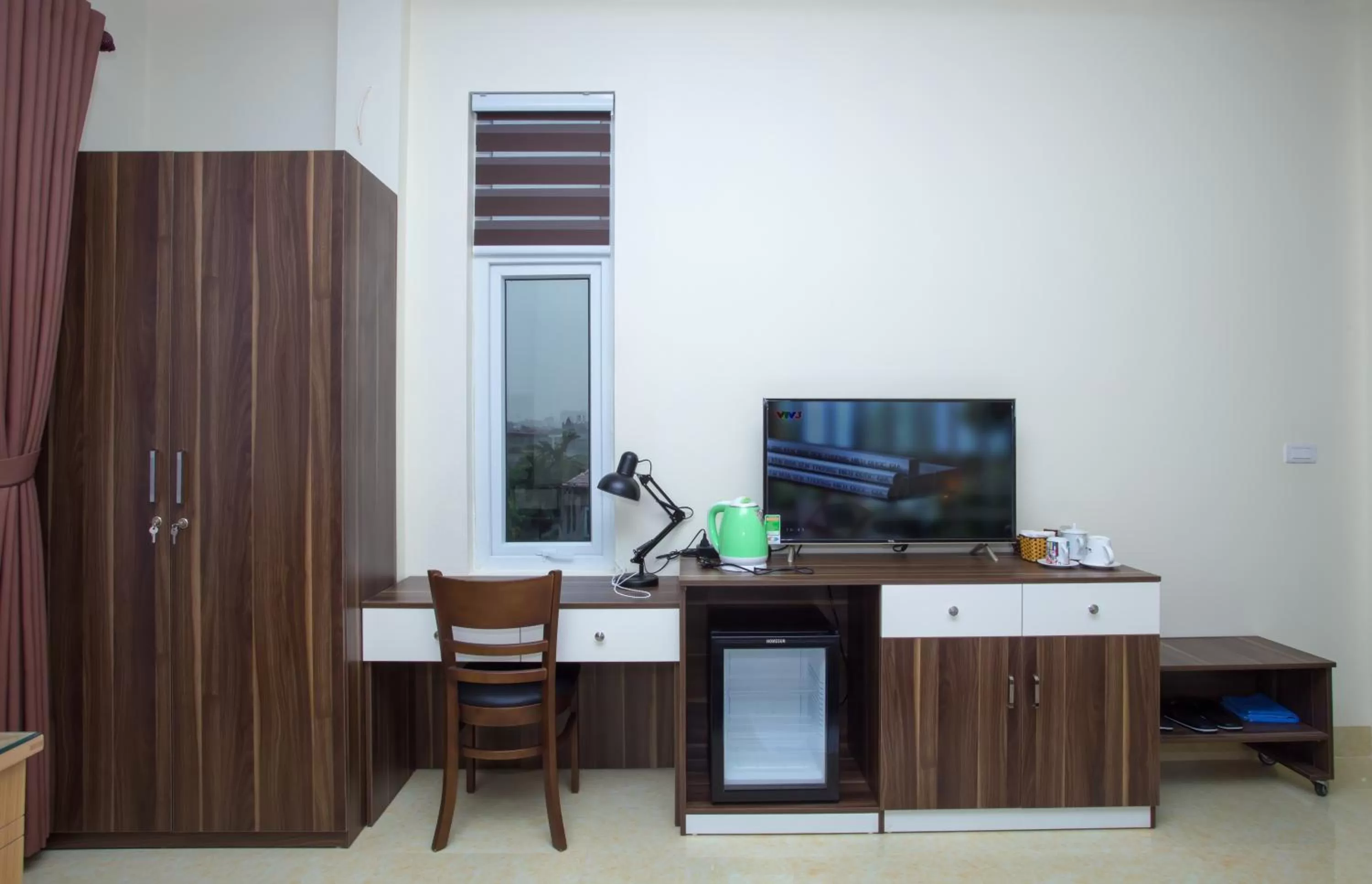 Bedroom in Friendly Home Hotel