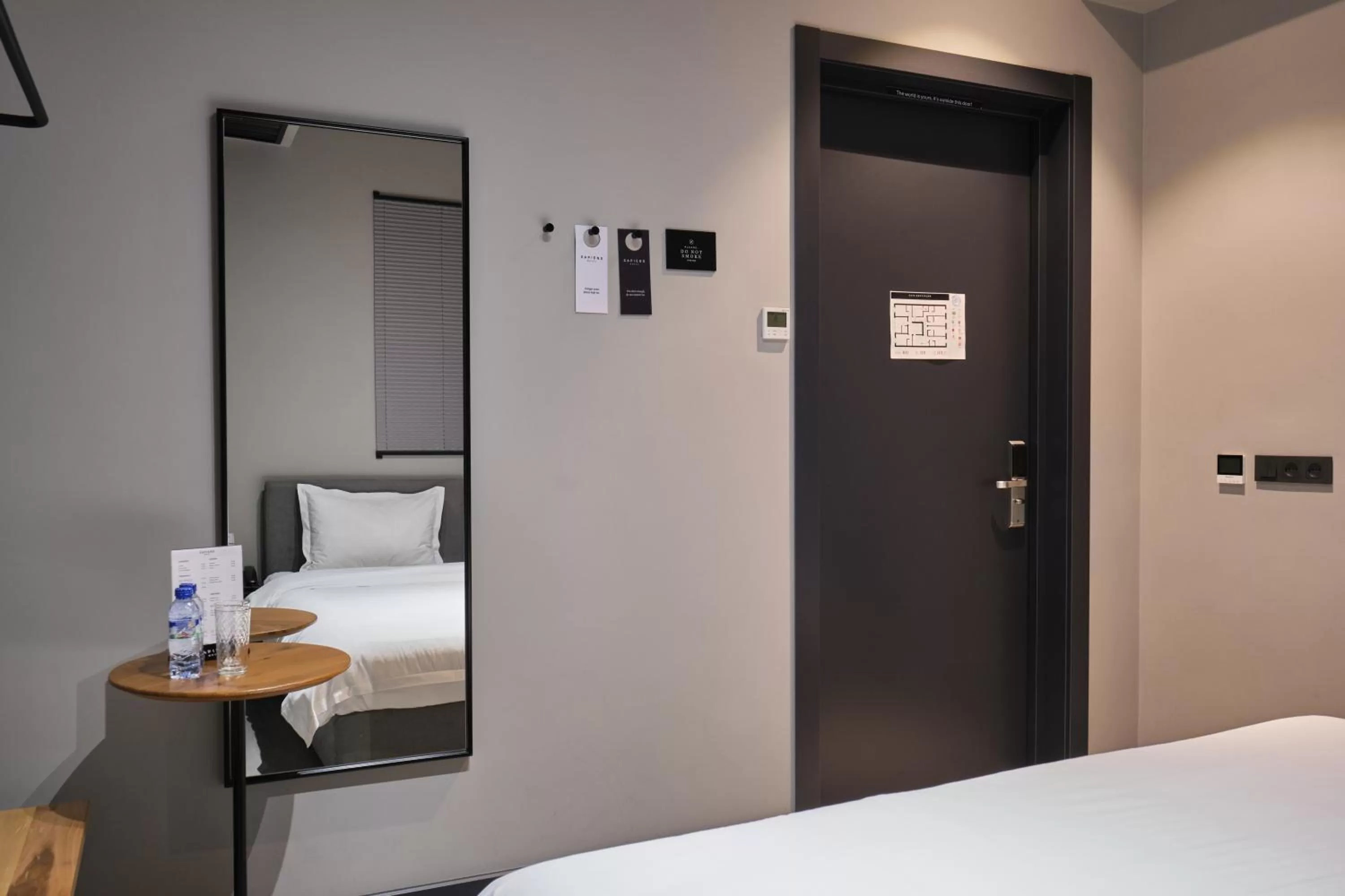 Bed in Sapiens Hotel