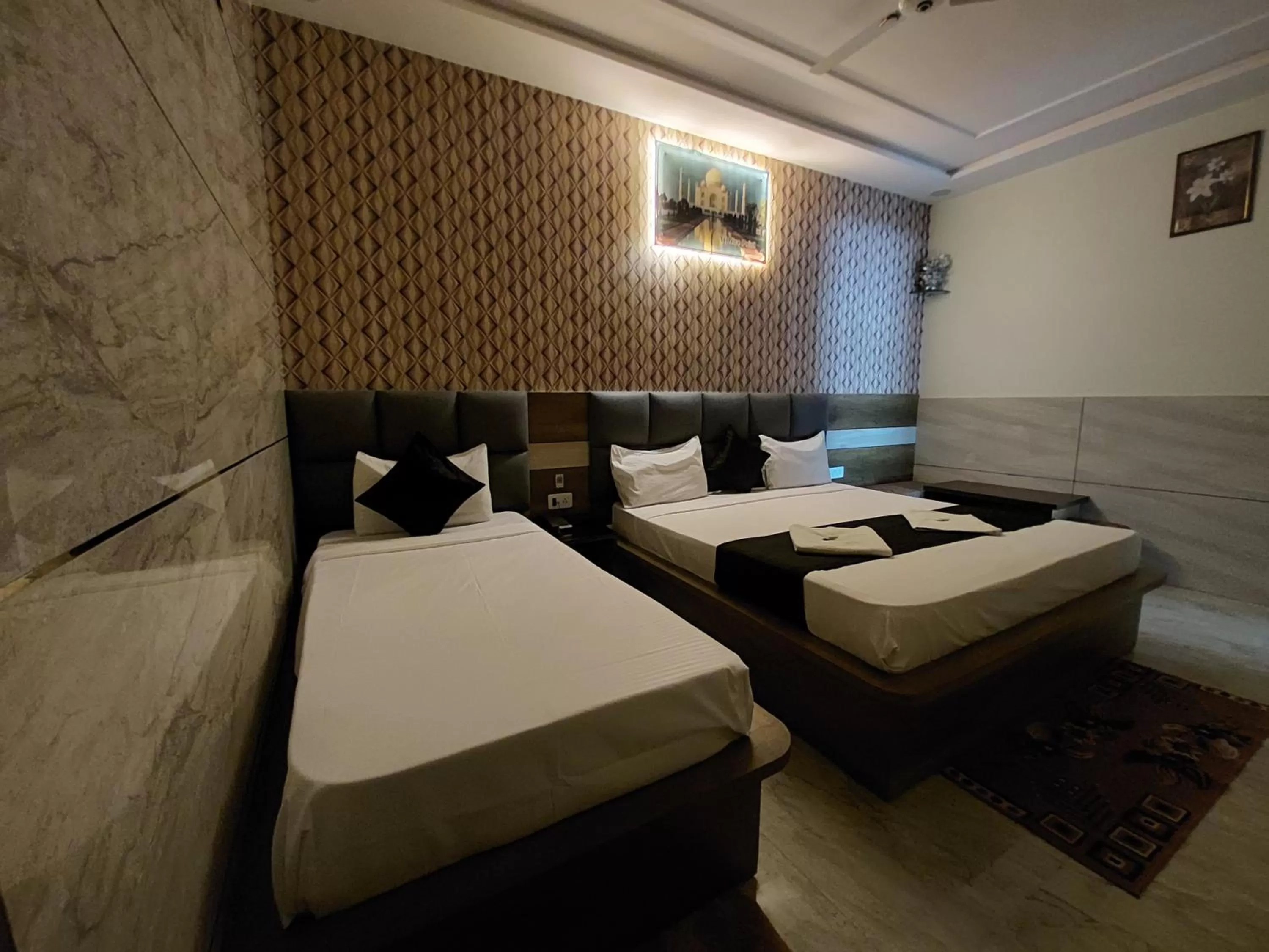 Living room, Bed in Taj Nice Point Manage by Taj Sunrise Group