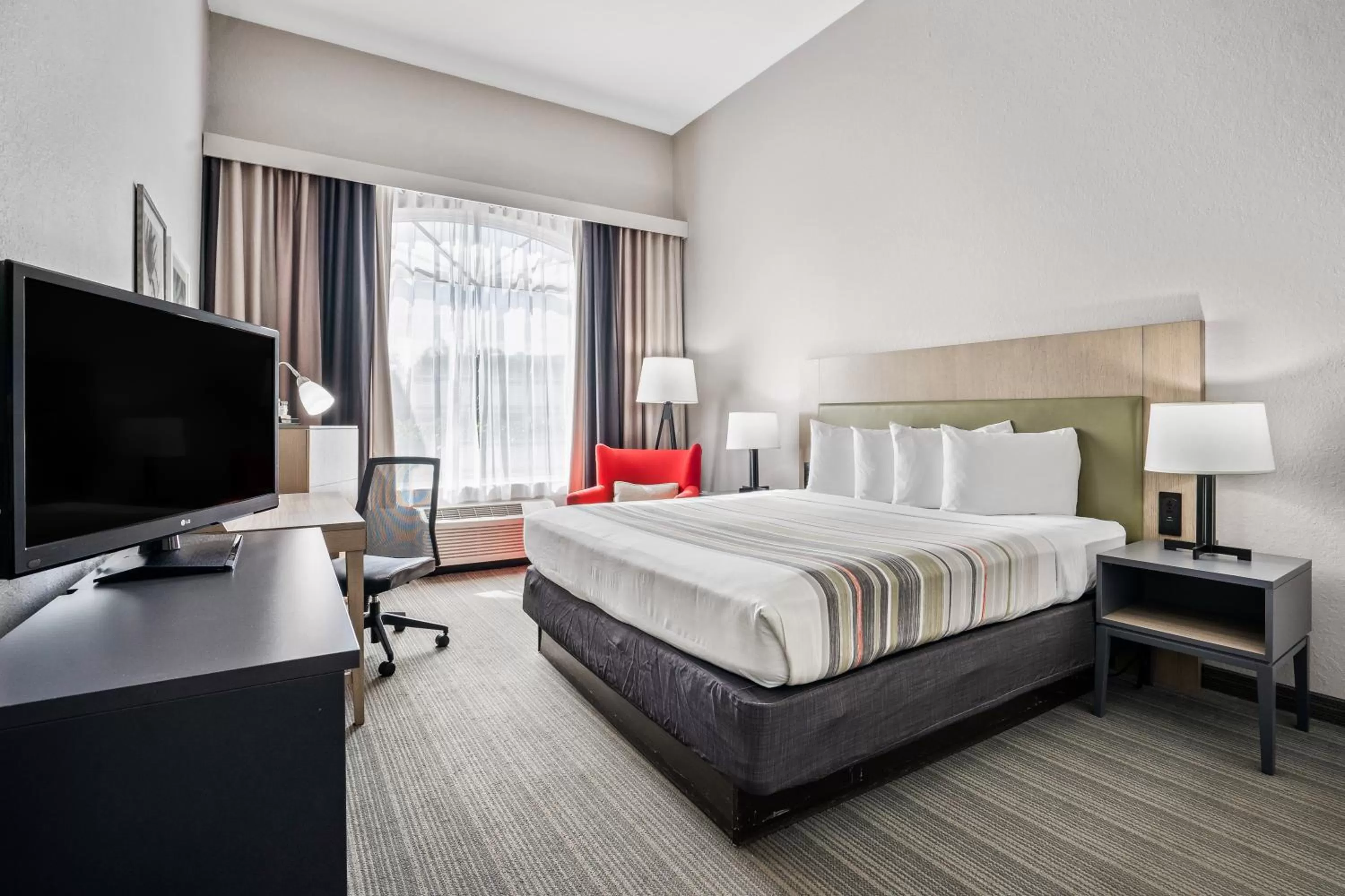 Bedroom, Bed in Country Inn & Suites by Radisson, Port Canaveral, FL