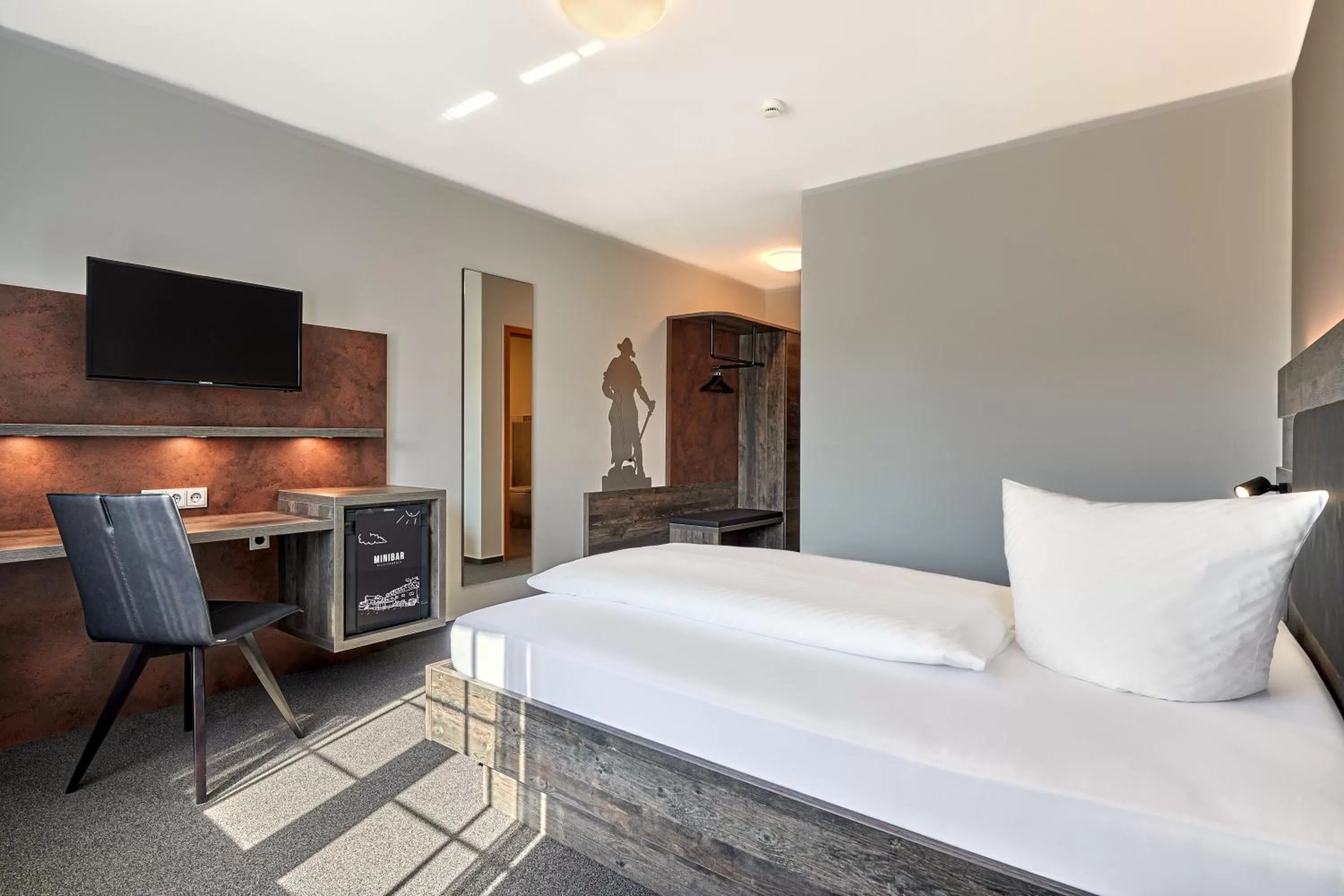 Photo of the whole room, Bed in Hotel Pfeffermühle