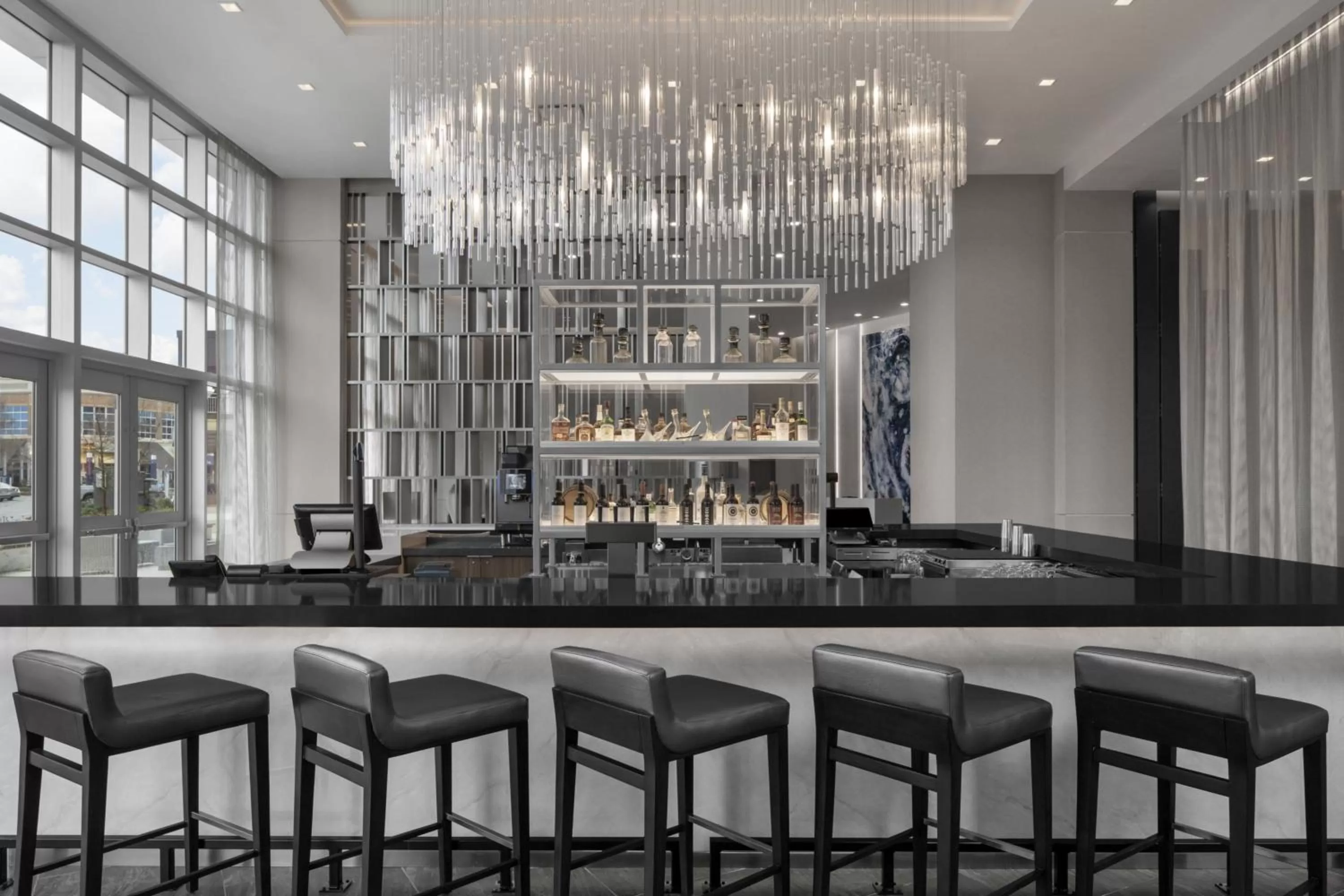 Lounge or bar in AC Hotel by Marriott Charlotte Ballantyne