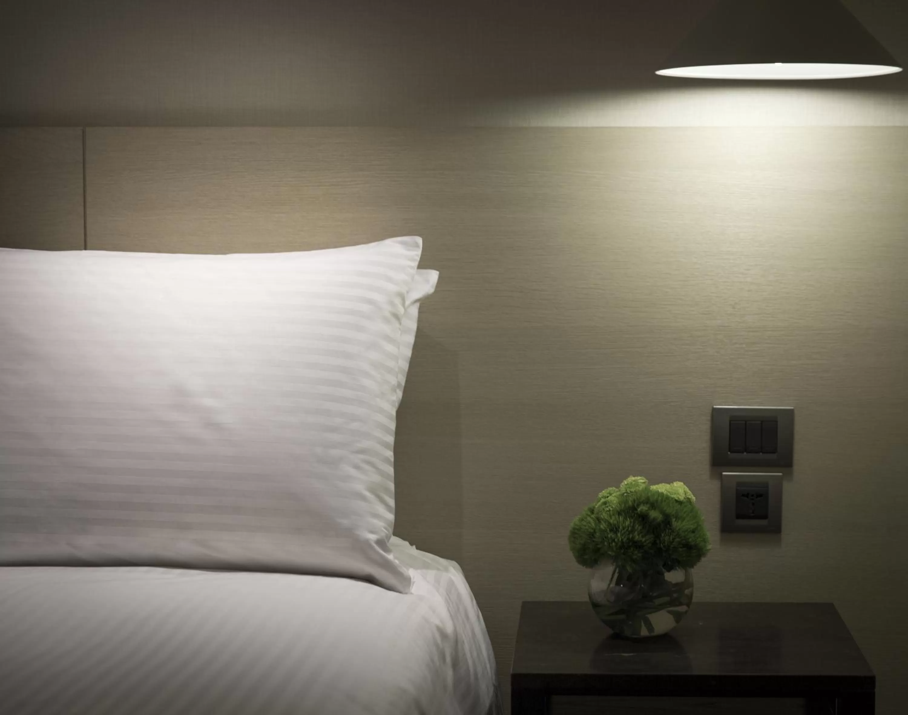 Decorative detail, Bed in Riverview Suites Taipei