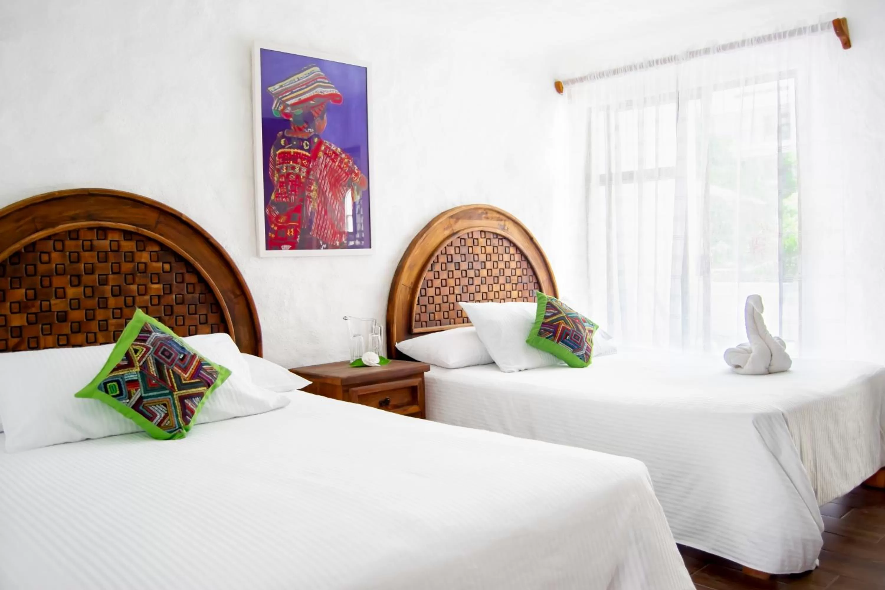 Bed in Petit Hotel Pilitas