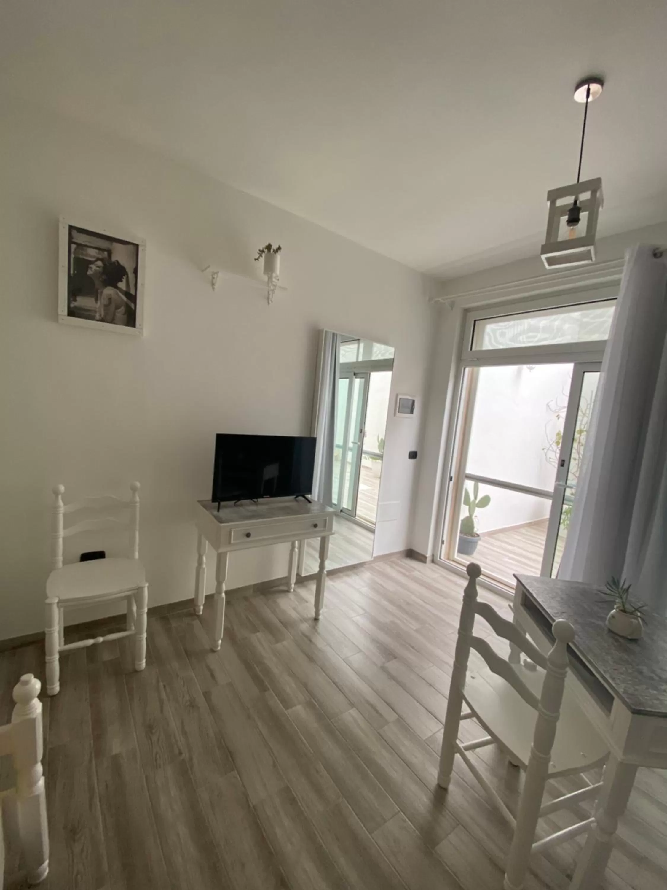 Photo of the whole room, TV/Entertainment Center in La casa di Nina