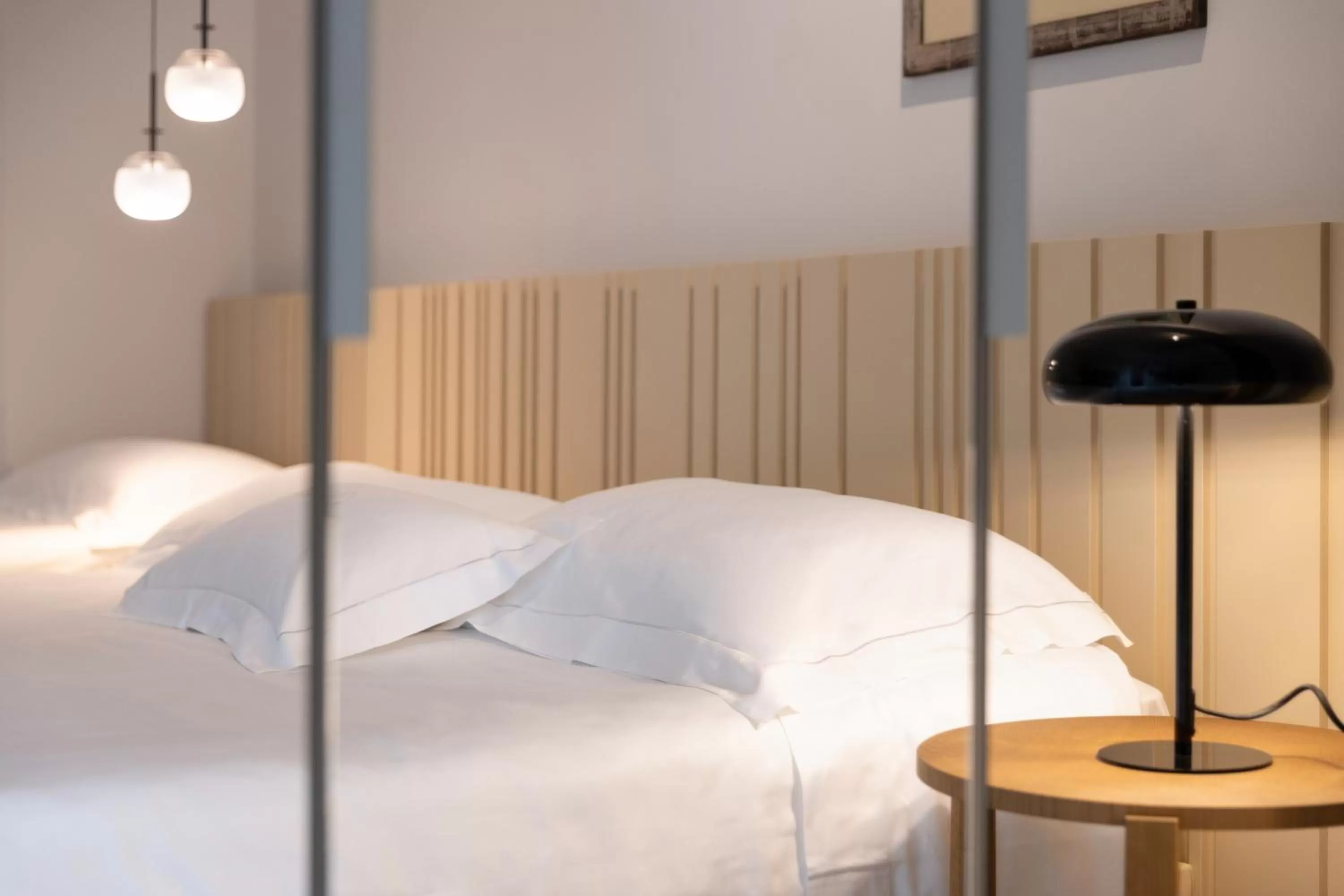 Bed in Taodomus Boutique Hotel