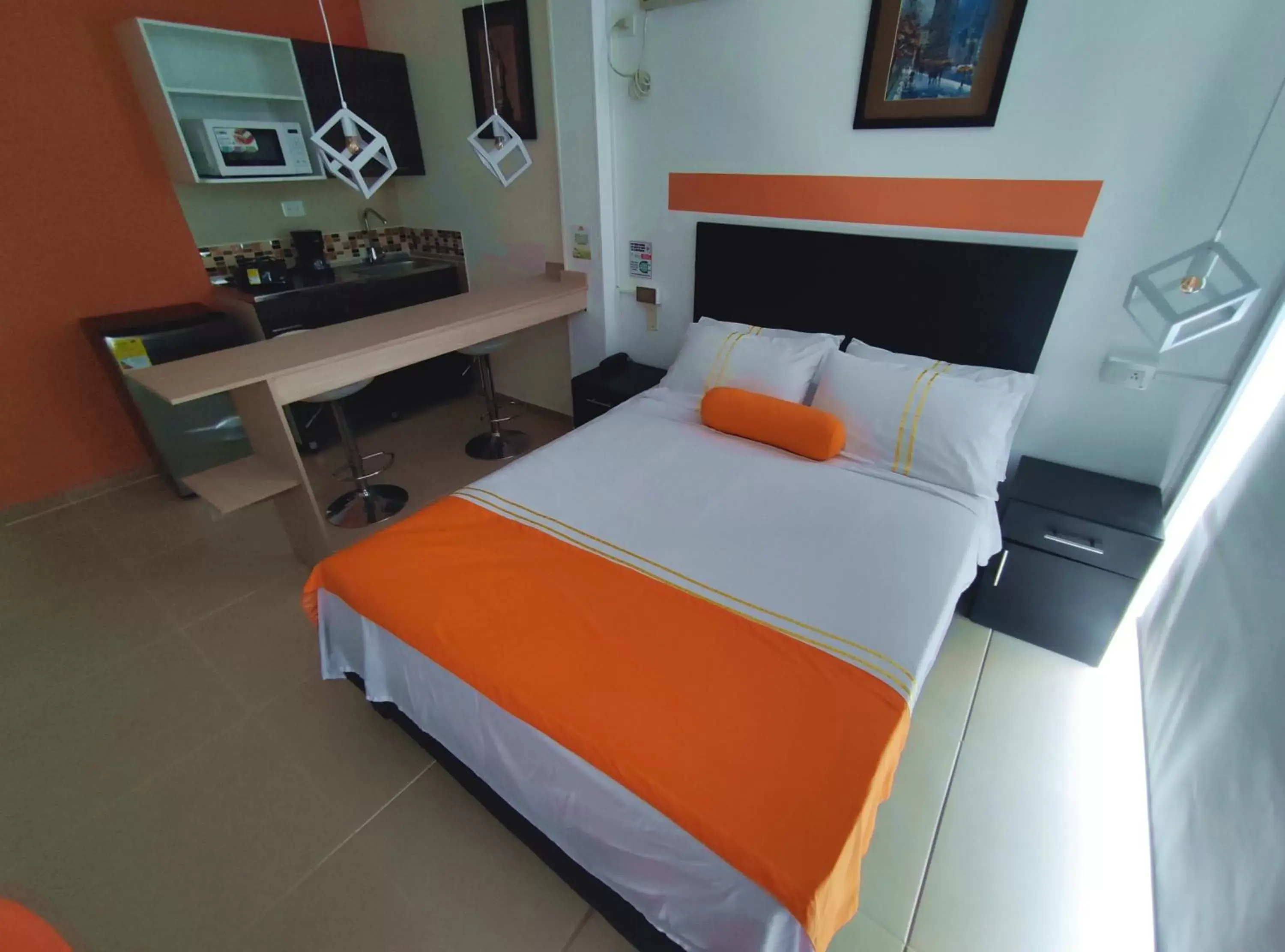 Deluxe Double Room with Balcony in HOTEL COLOURS Cali Deluxe Double Room with Balcony in HOTEL COLOURS Cali