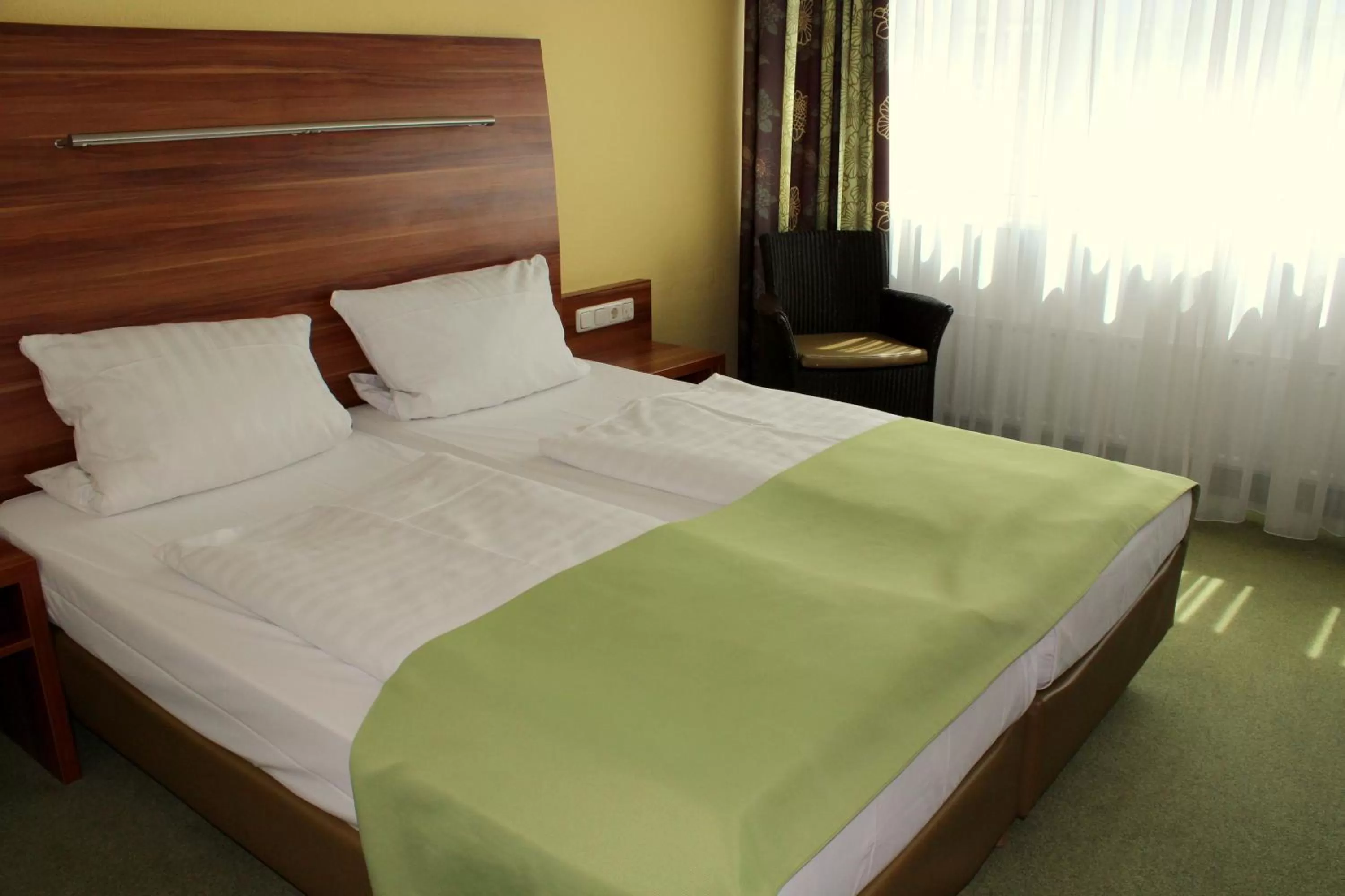 Bed in NP Hotel Wallis