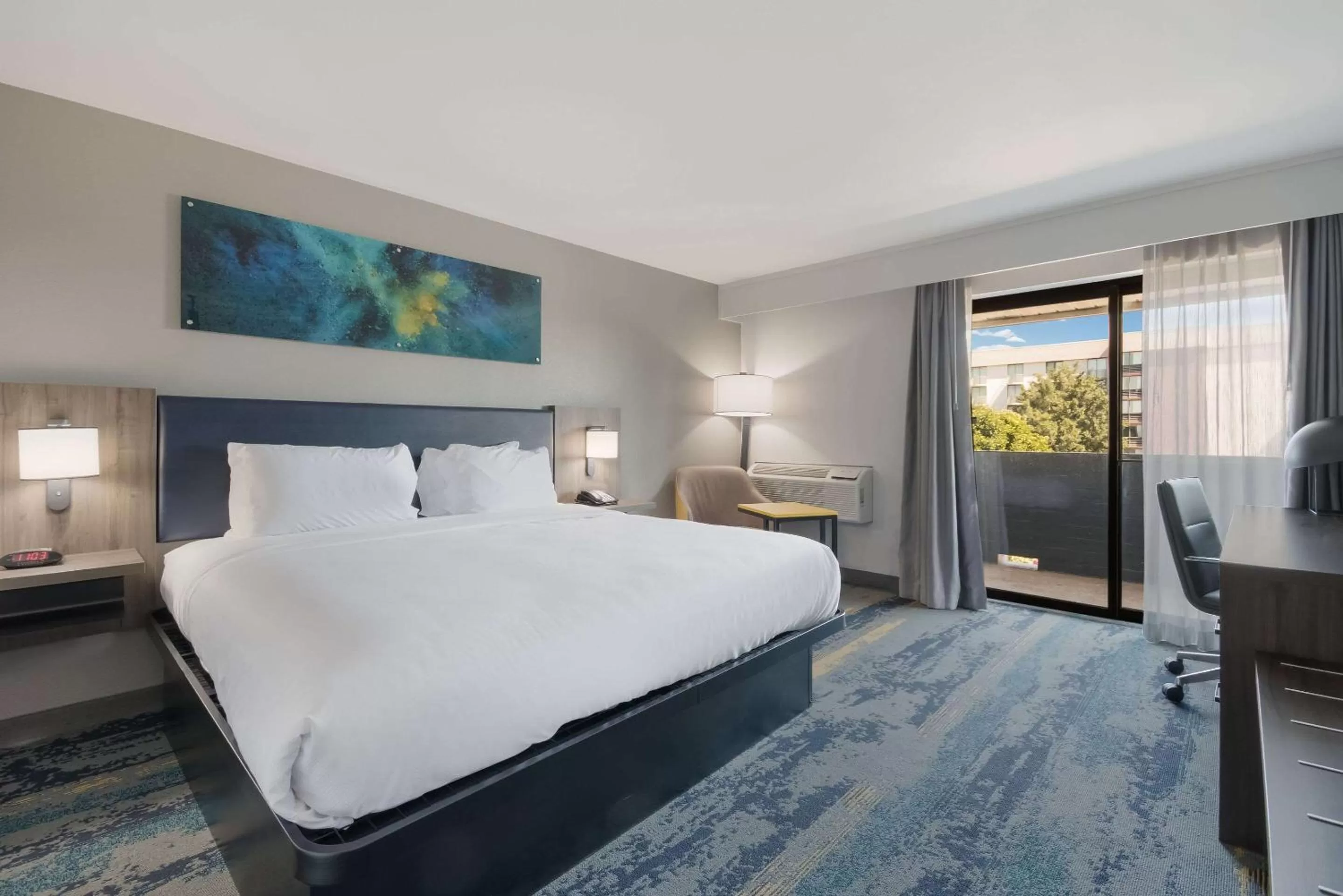 Bedroom in Clarion Pointe OKC Airport