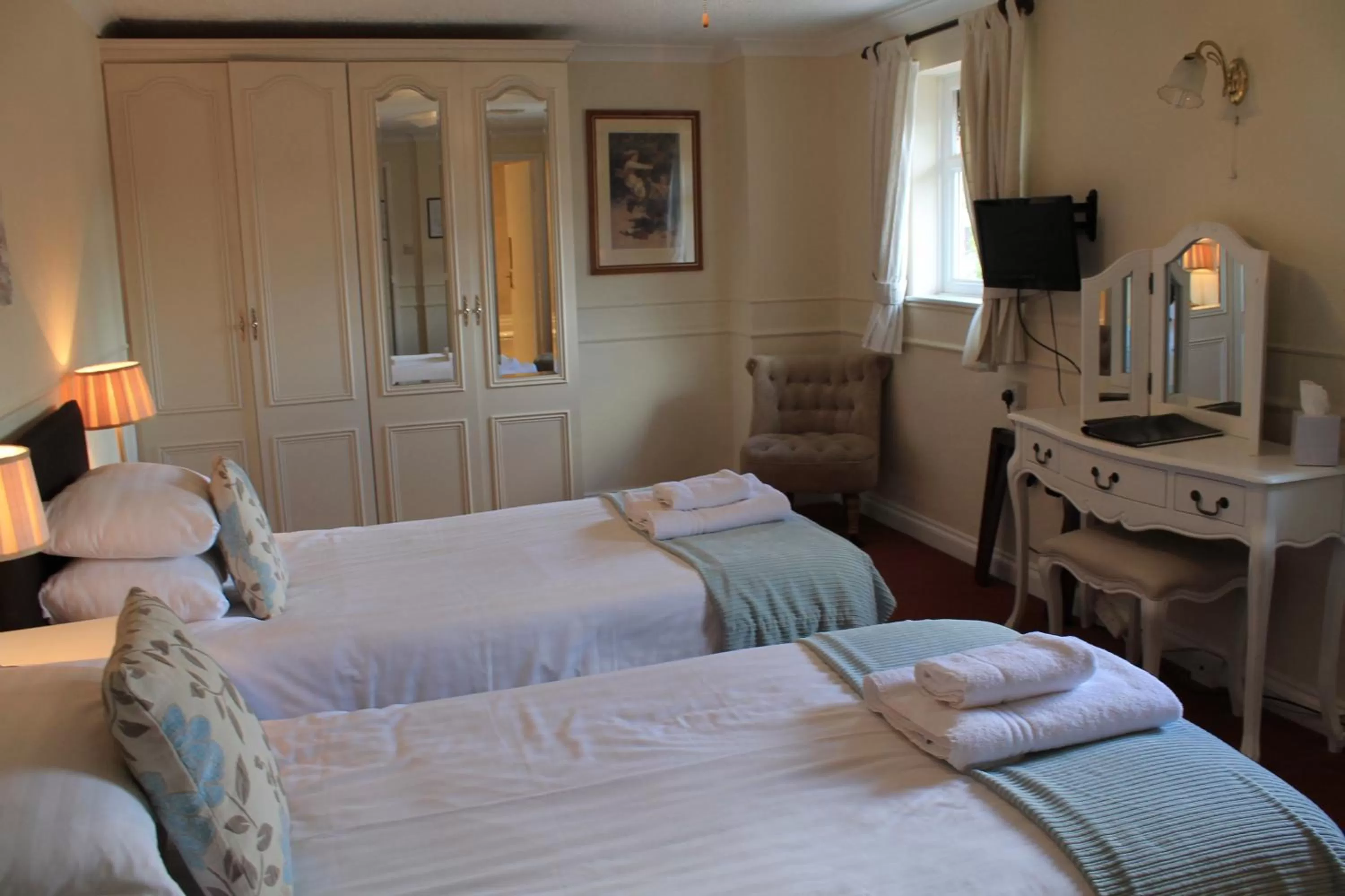 Decorative detail, Bed in Old Court Hotel & Apartments