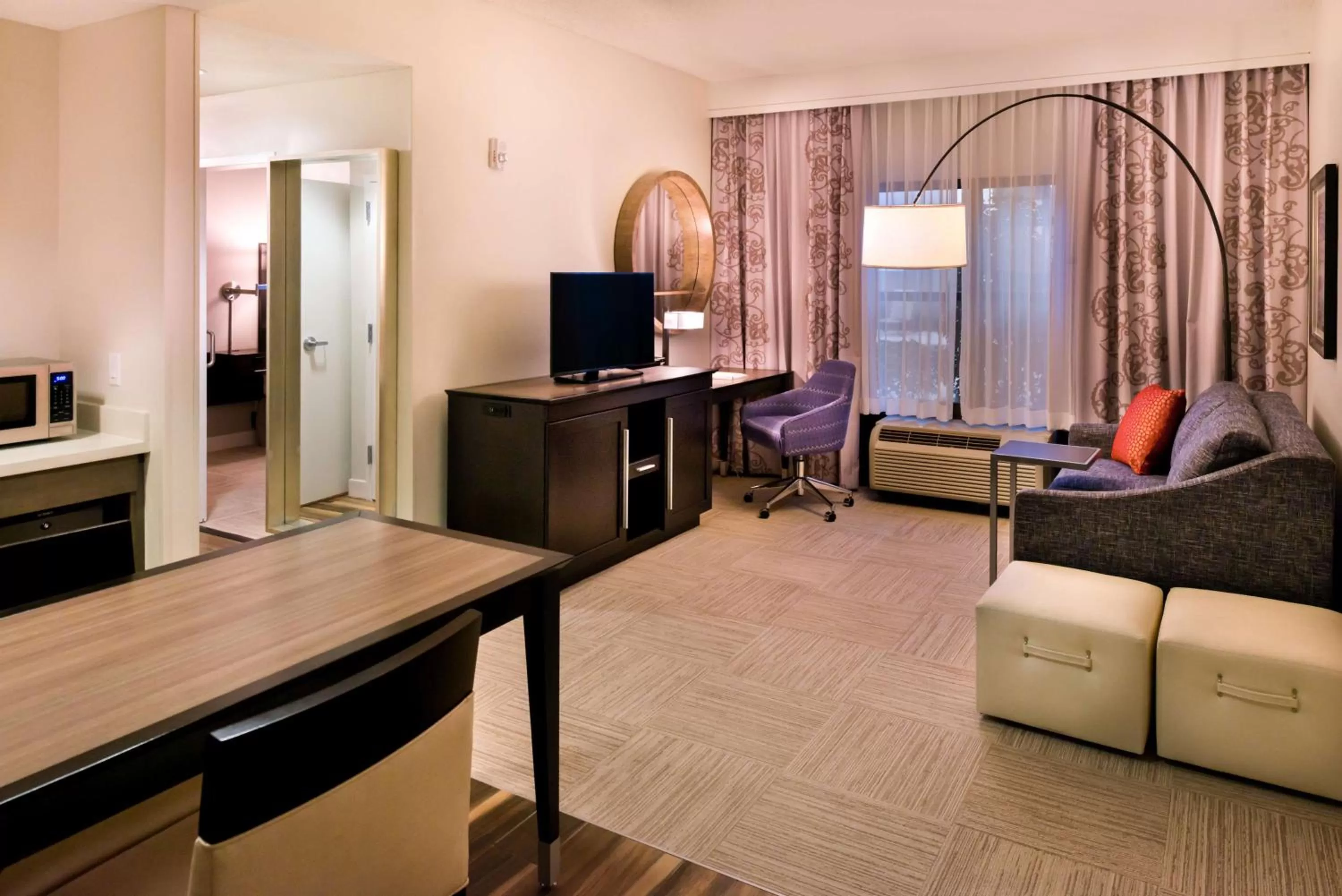 Living room in Hampton Inn & Suites Orlando-East UCF