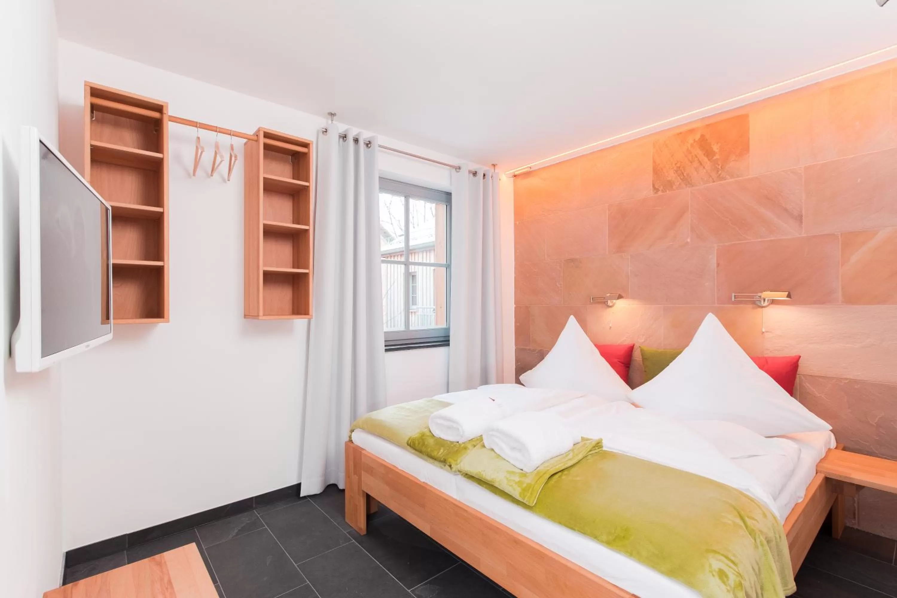 Photo of the whole room, Bed in Biohotel Kunstquartier