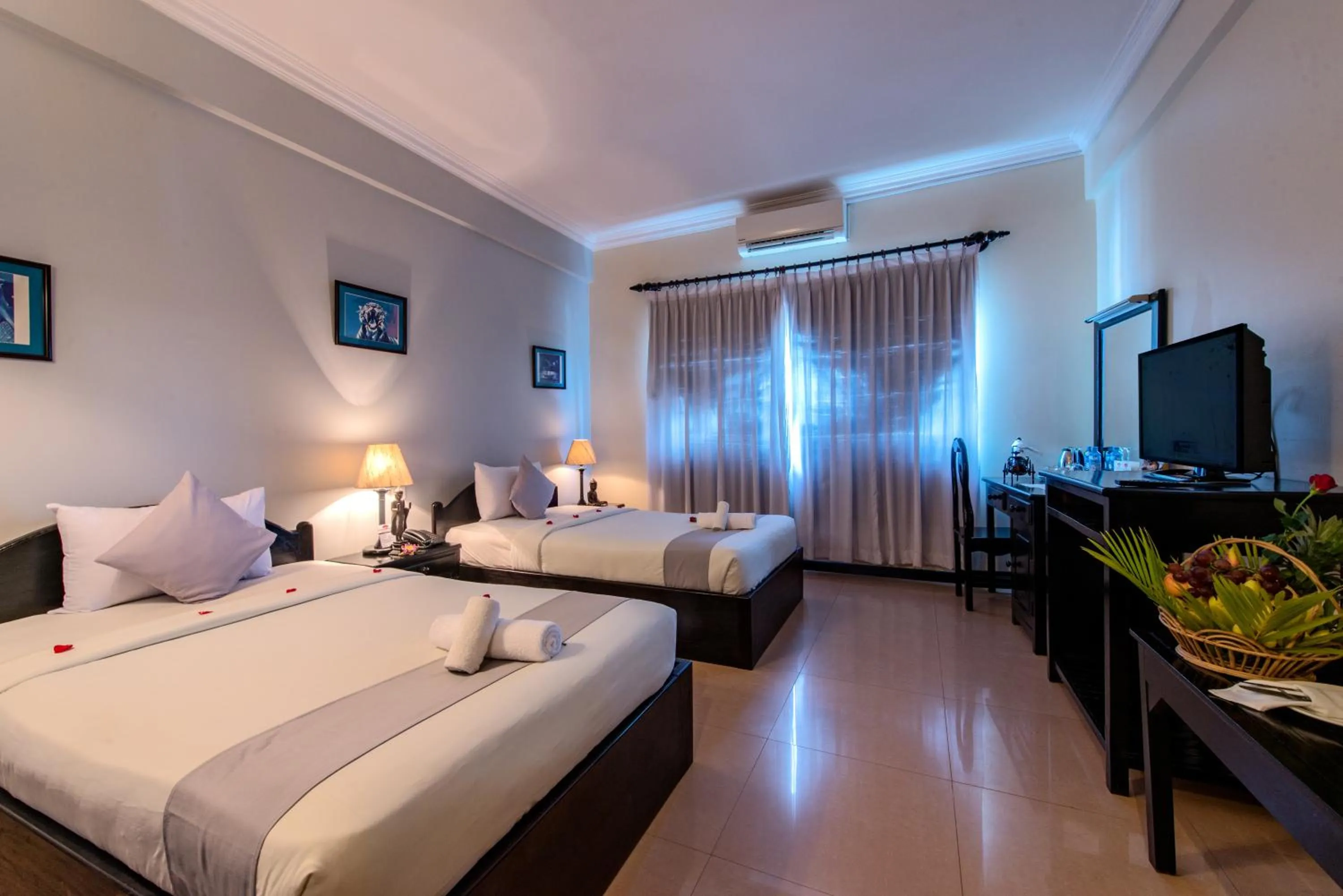 Photo of the whole room, Bed in Angkor Panoramic Boutique Hotel