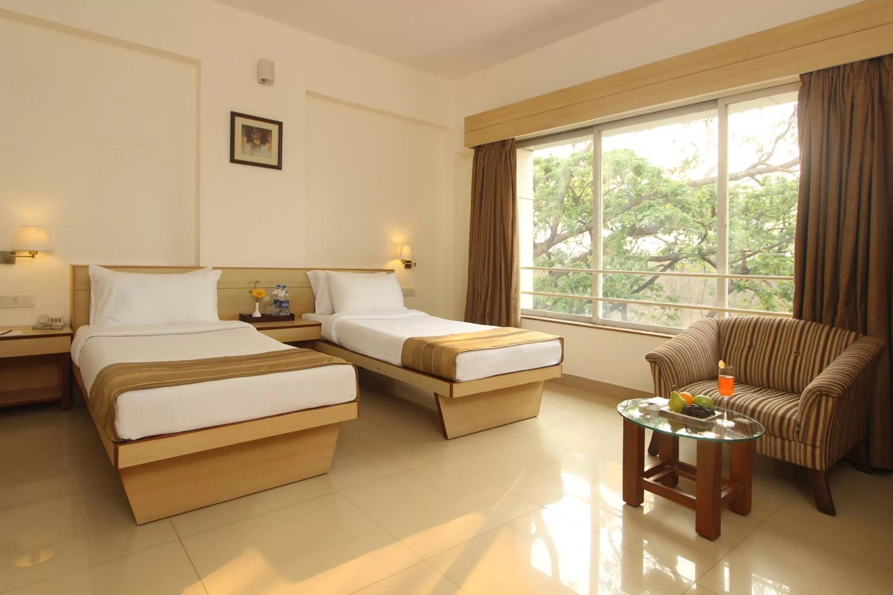 Photo of the whole room, Bed in Hotel Phoenix Koregaon Park