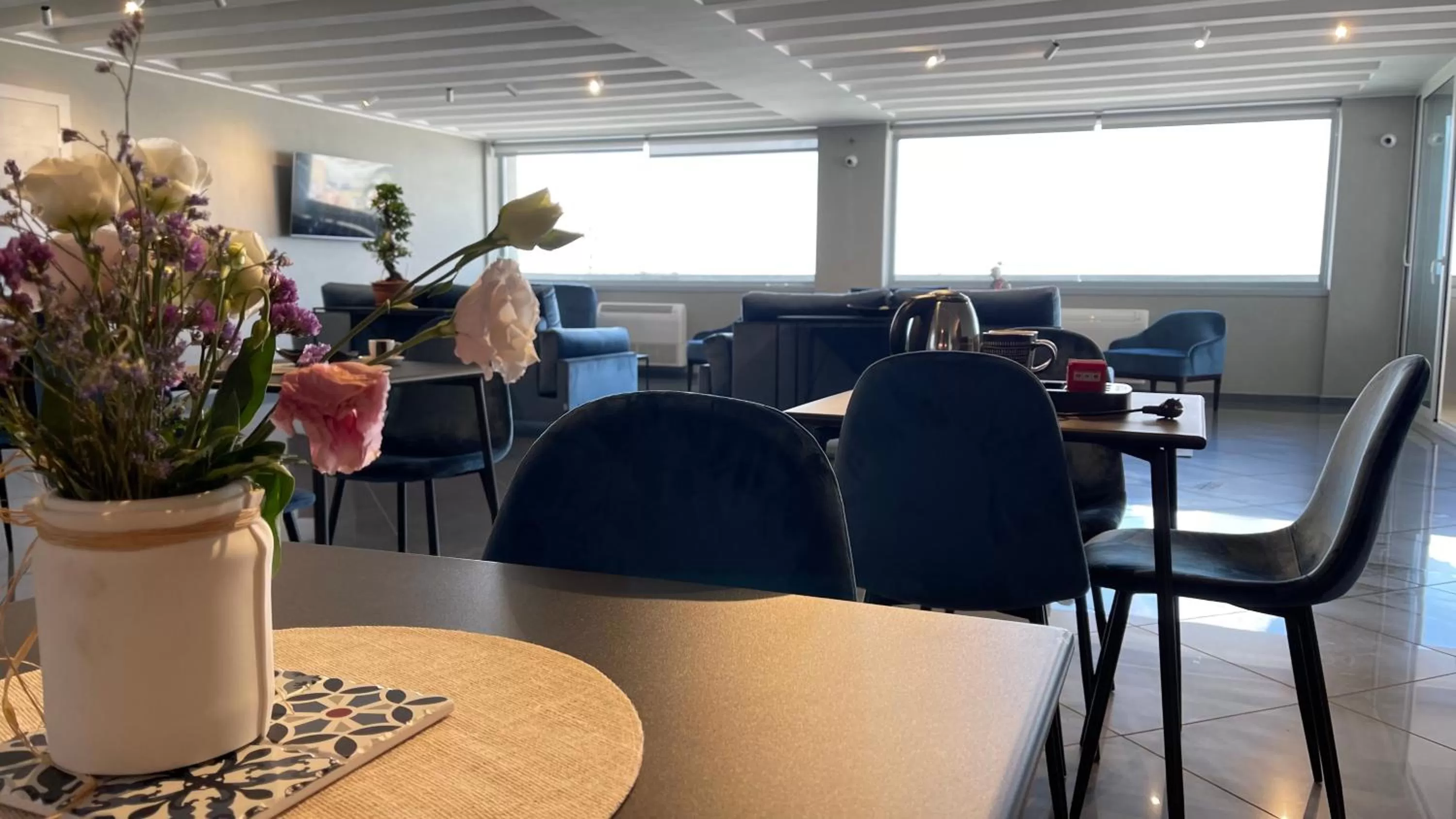 Communal lounge/ TV room in UpTown Urban Stay Lecce