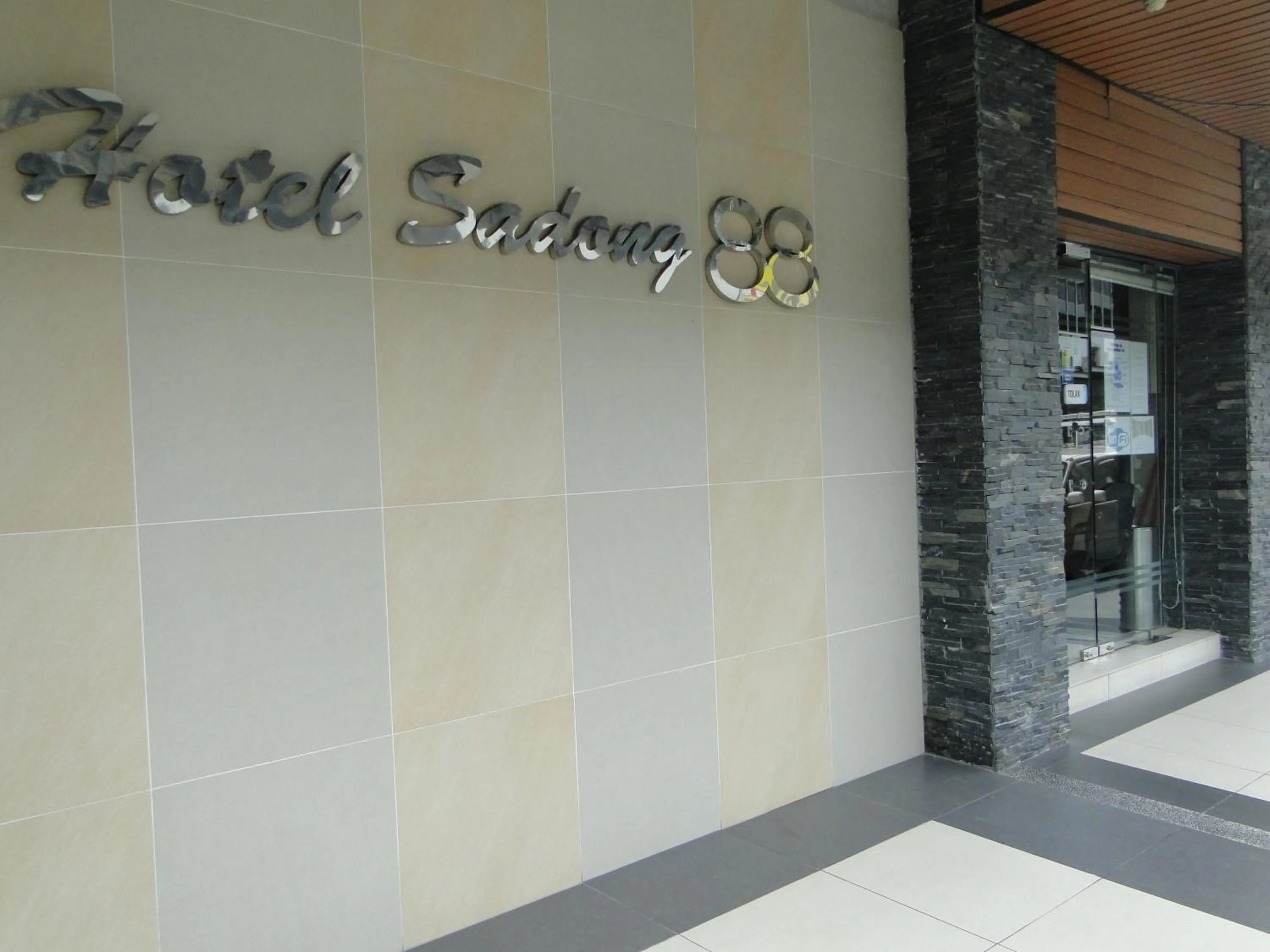 Property logo or sign in Hotel Sadong88