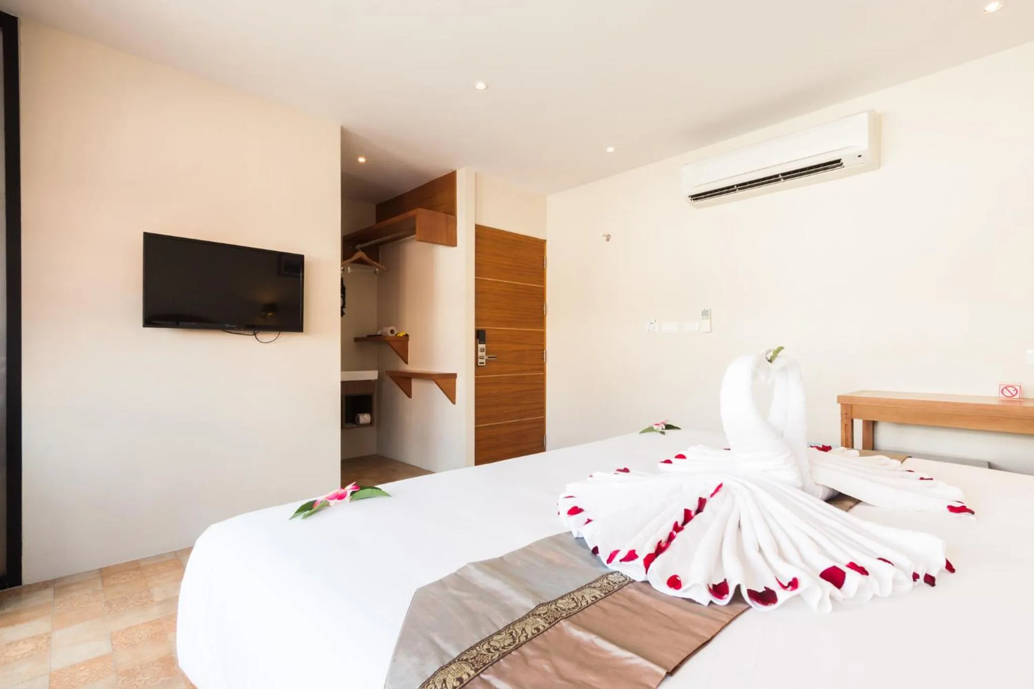 TV and multimedia, Bed in At Samui Boutique Hotel
