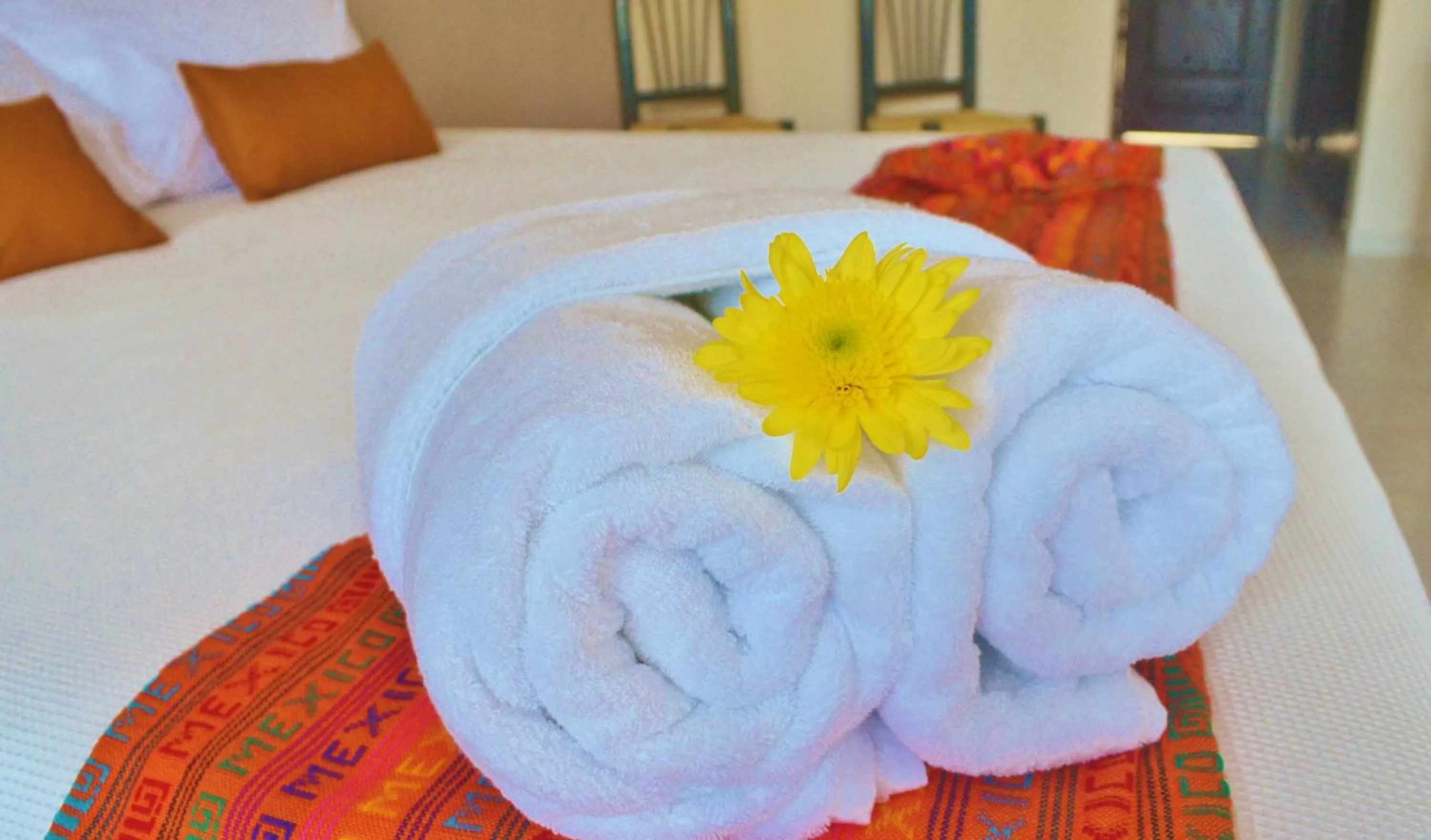 Bed in Hacienda Morelos Beachfront Hotel