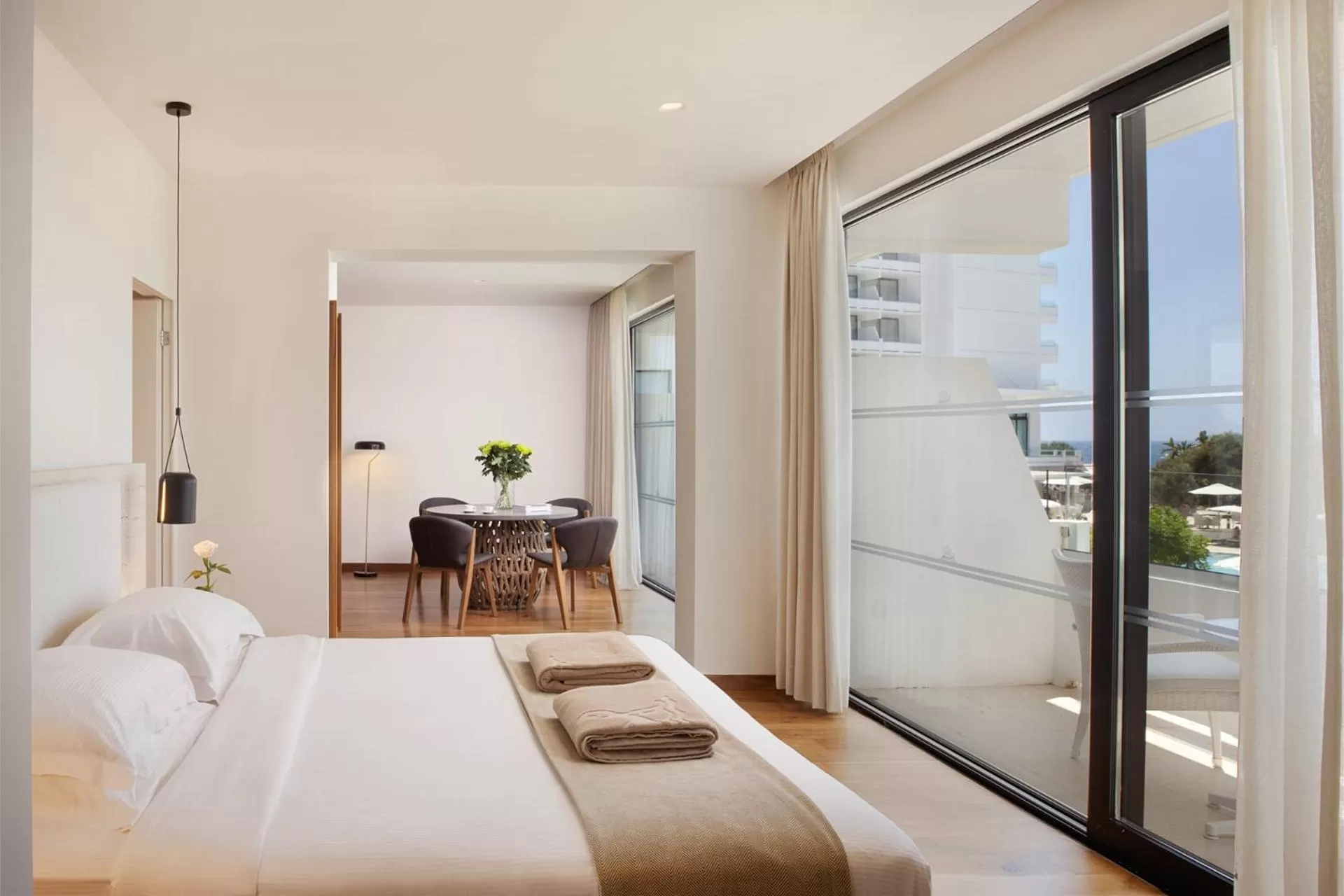 Dining area, Bed in Grecian Bay