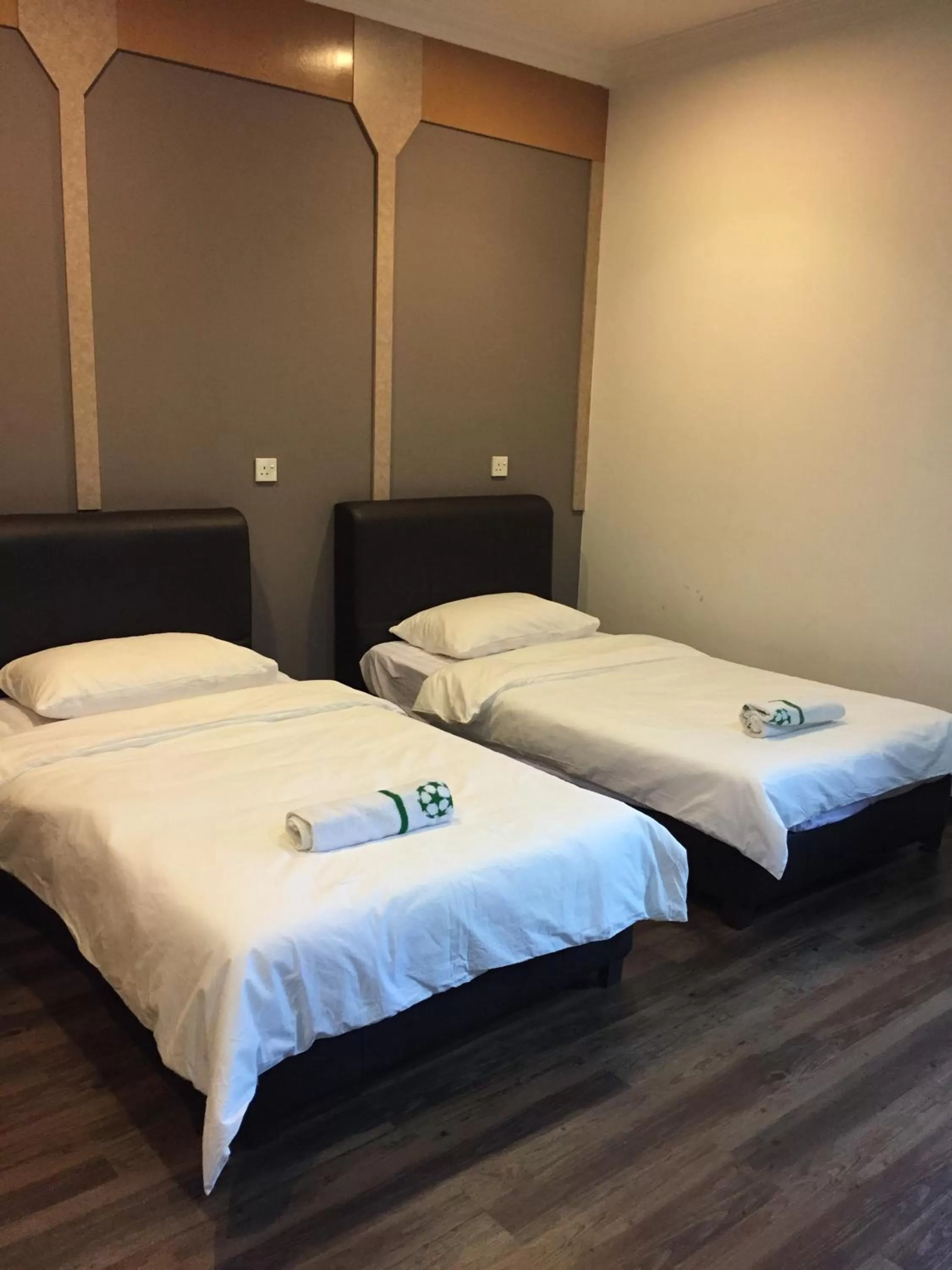 Photo of the whole room, Bed in Homestay Muar