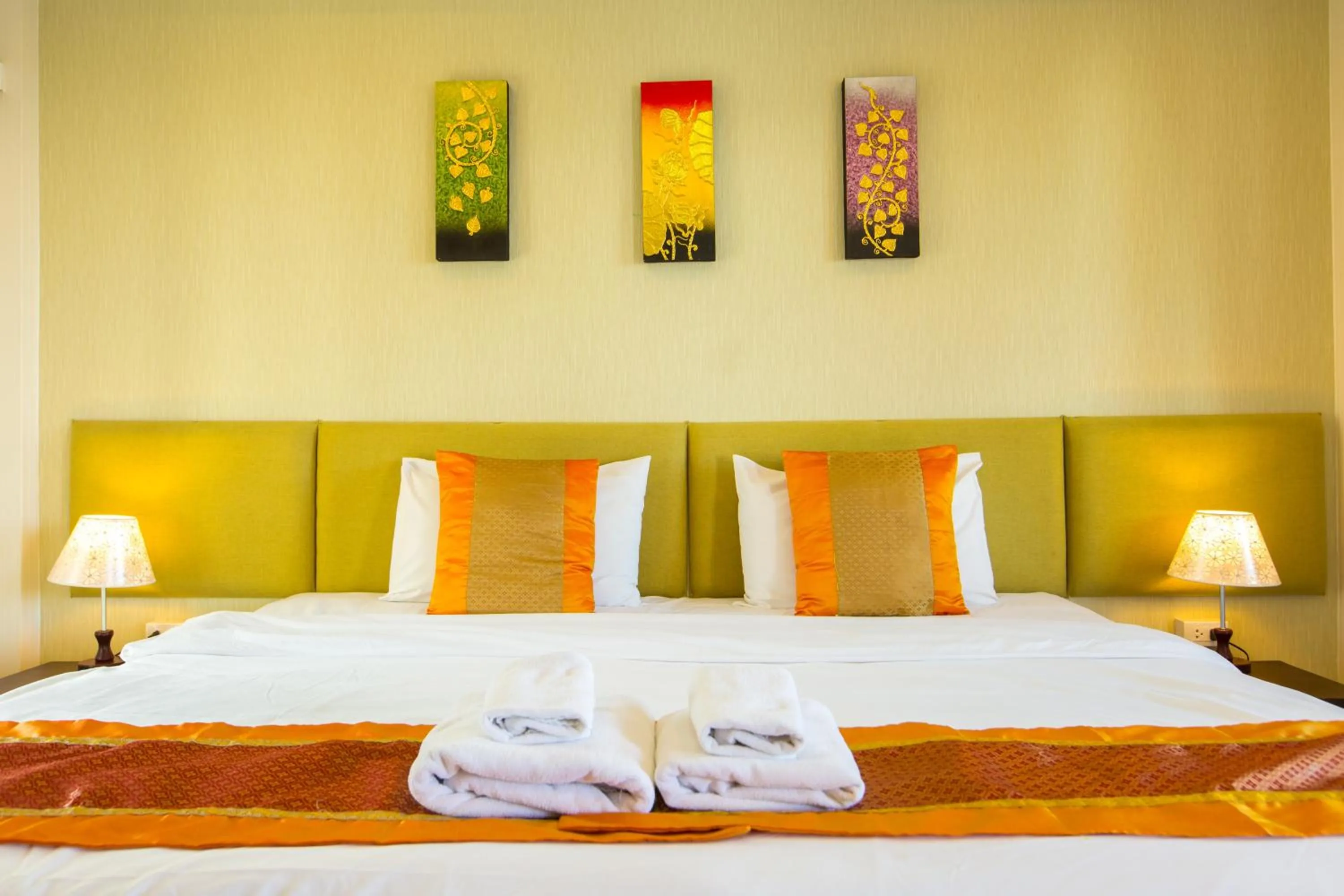 Decorative detail, Bed in Chiang Mai Waroros Boutique Hotel